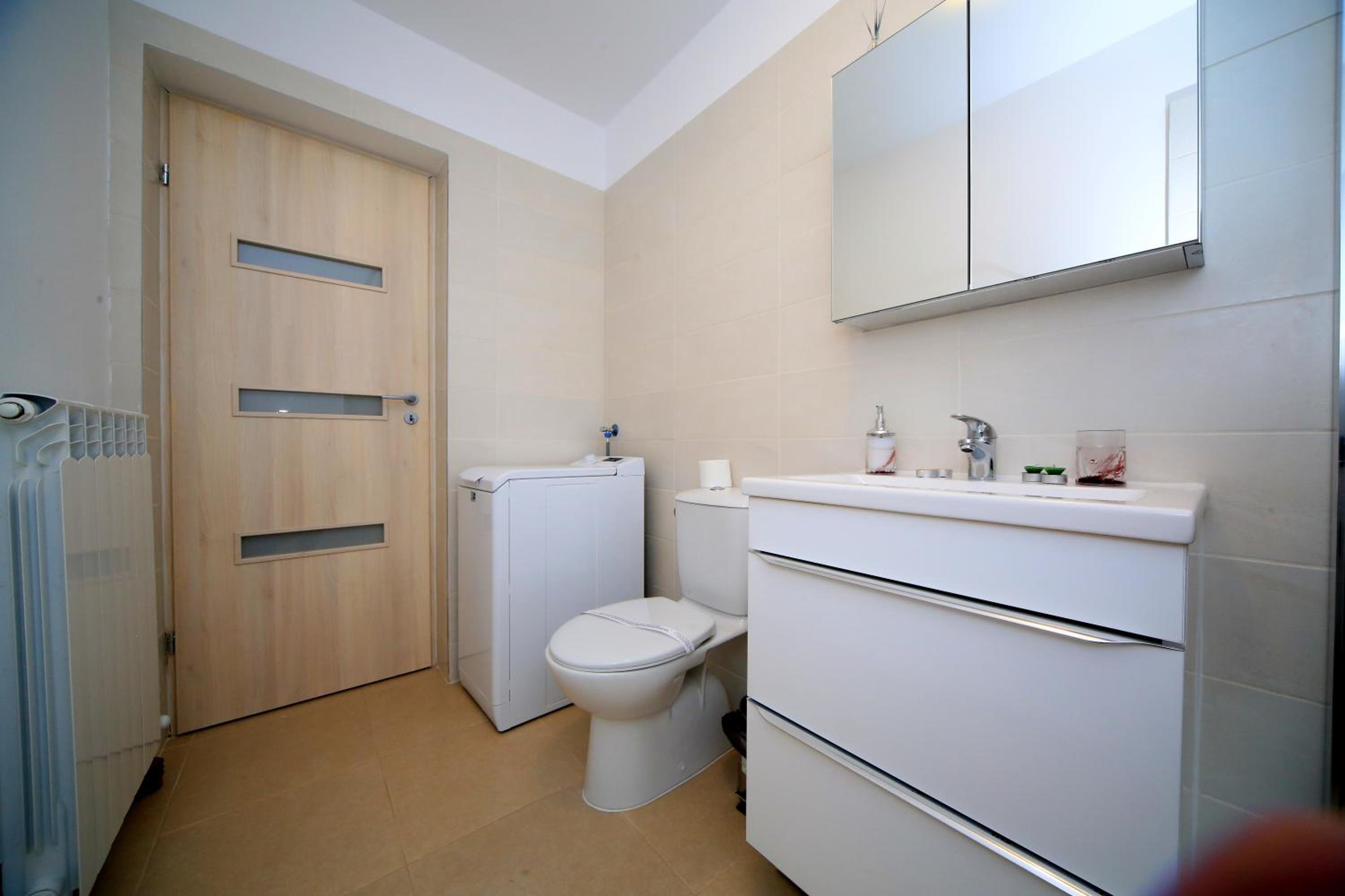 Three-Bedroom House - Photo 82