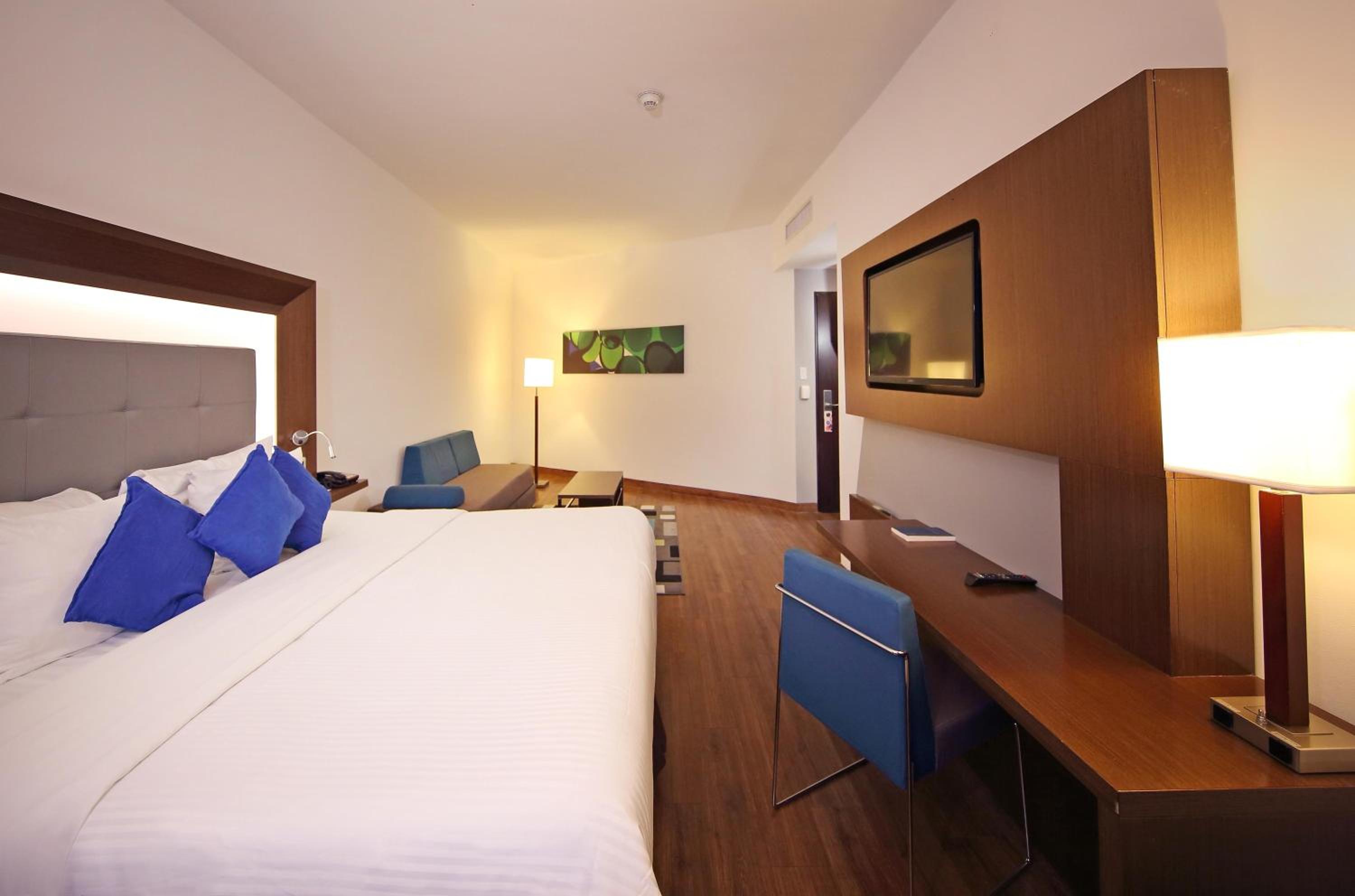 Executive Room with Two Double Beds and Sofa Bed