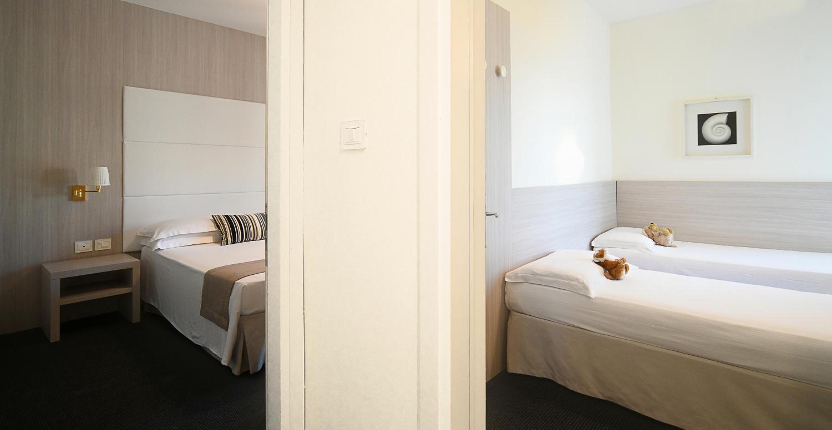 Two Connecting Rooms with Partial Sea View (2 Adults + 2 Children) photo 1