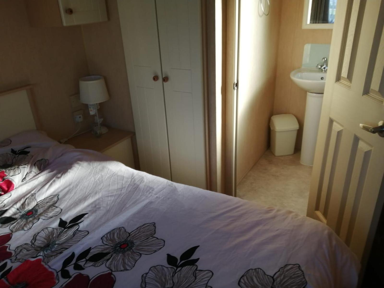 Three-Bedroom House - Photo 31