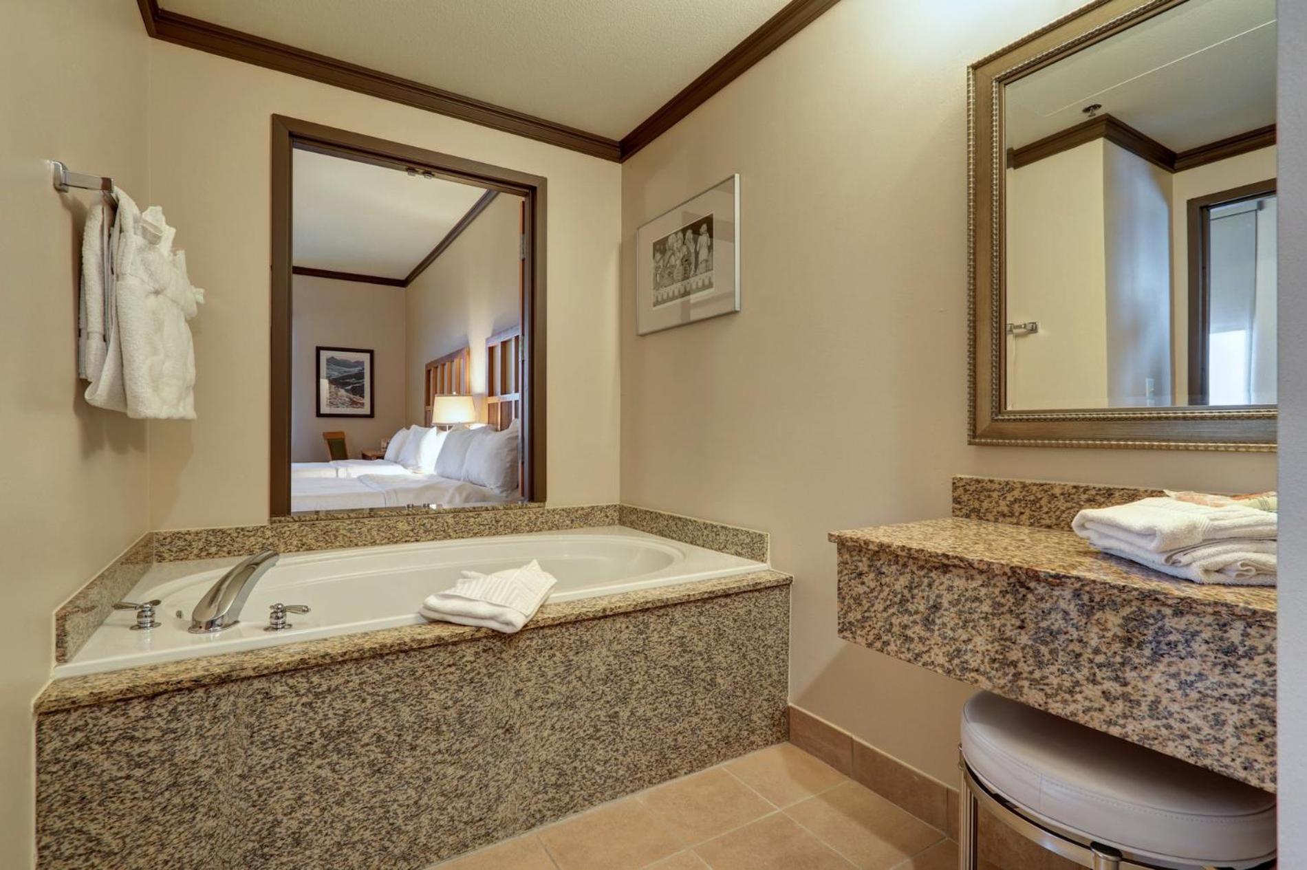 Queen Room with Two Queen Beds - Photo 10