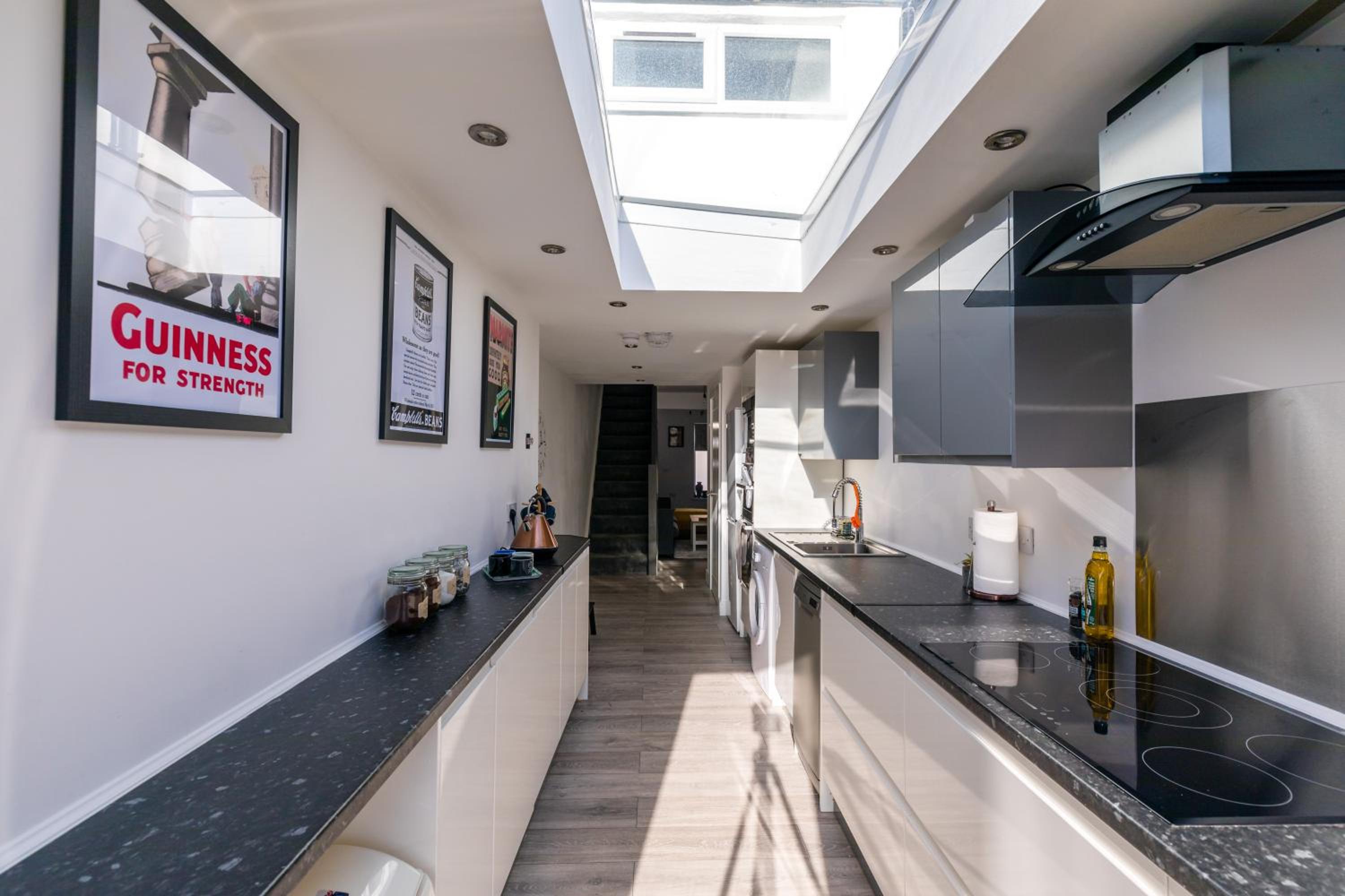 Three-Bedroom House - Photo 25