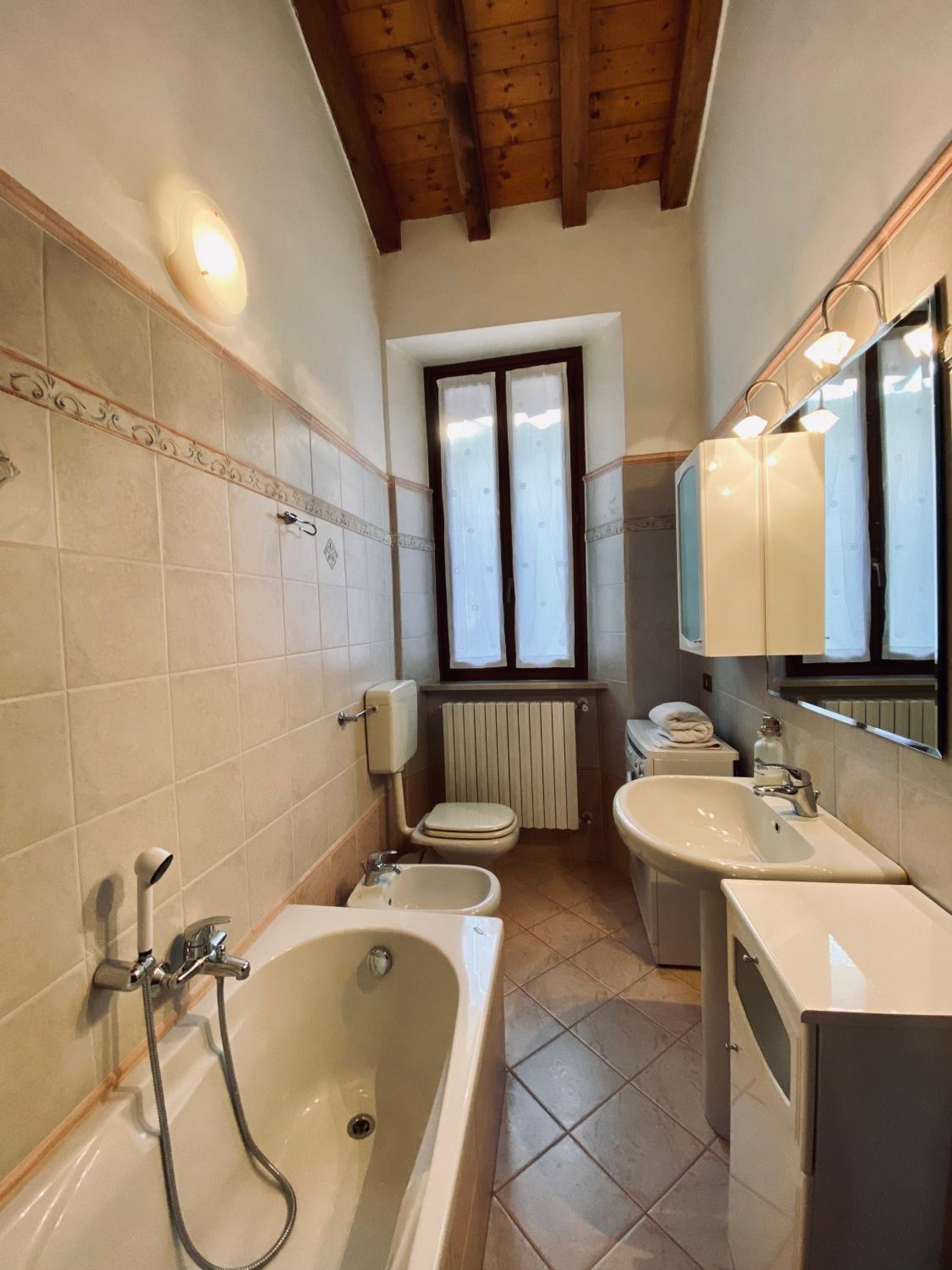Two-Bedroom Apartment - Photo 32