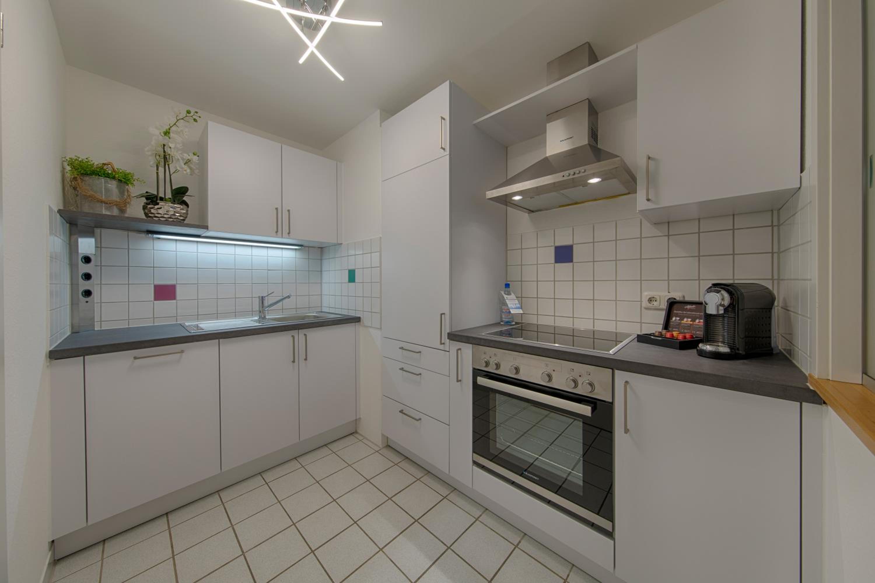 Comfort Apartment - Photo 13