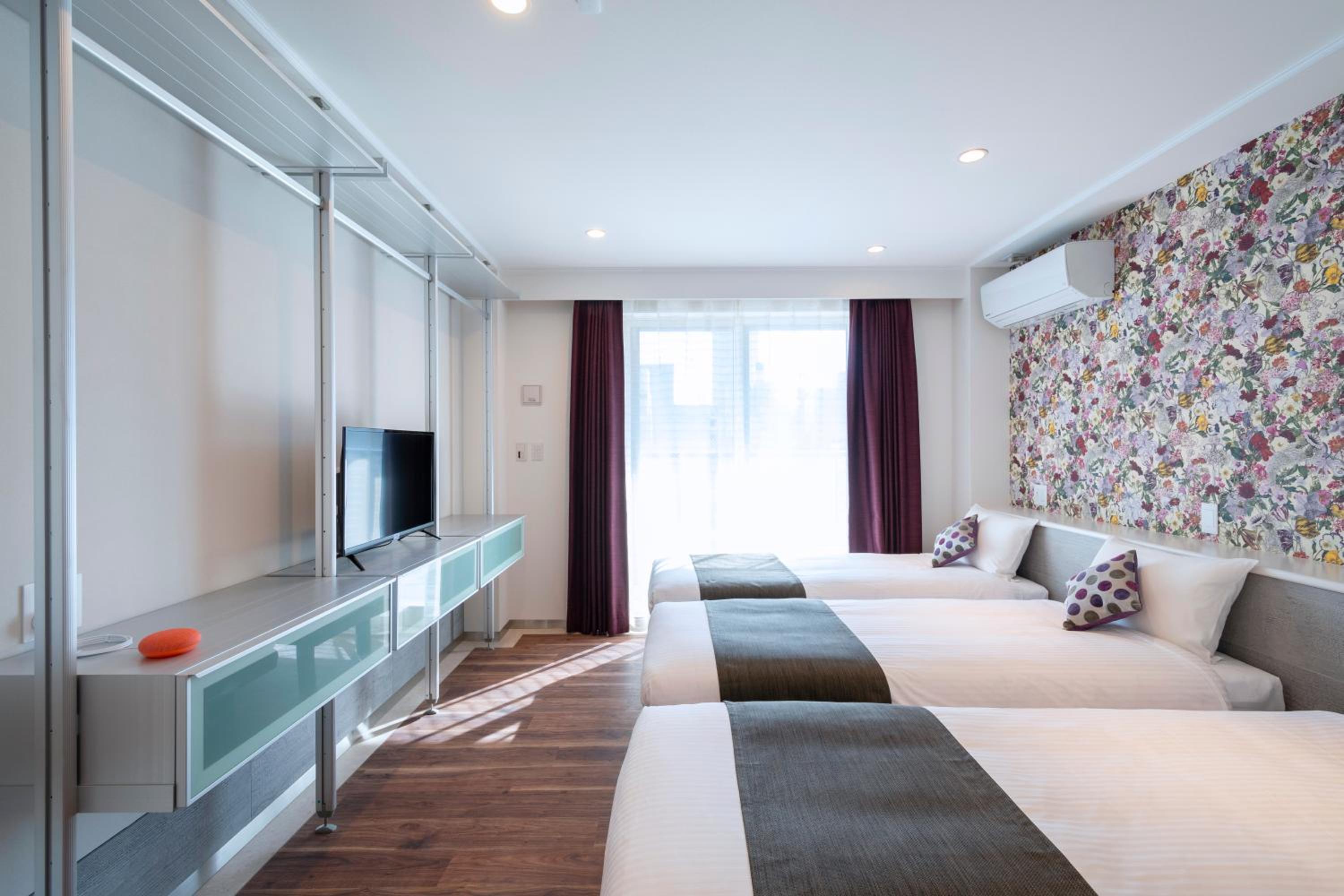 Deluxe Triple Room