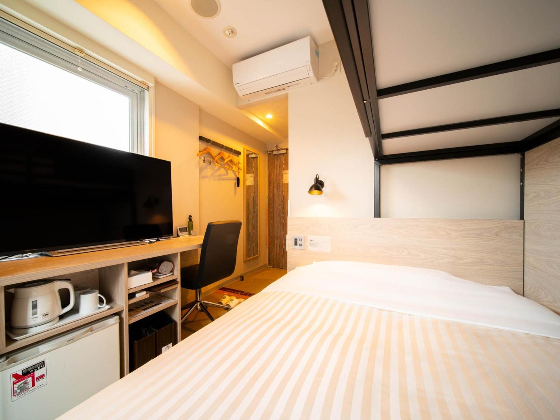 Room with Double Bed and Bunk Bed - Non-Smoking photo 2