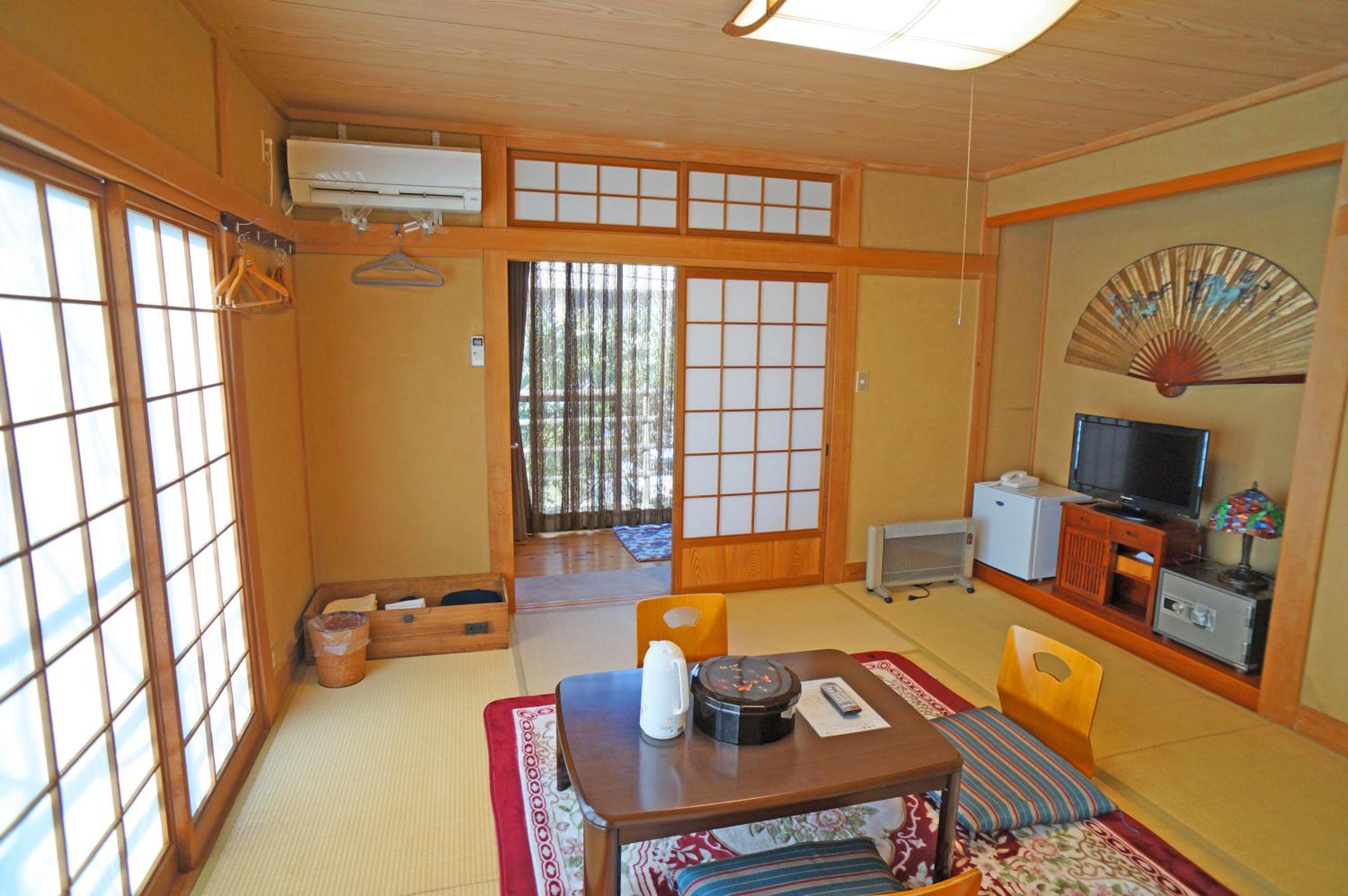 Triple Room with Shared Bathroom