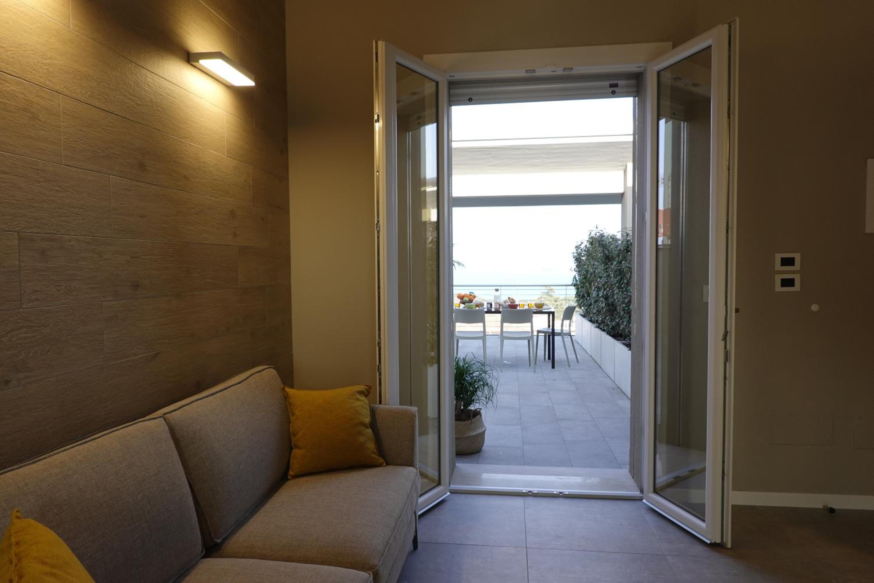 Two-Bedroom Penthouse Apartment with Terrace and Lake View