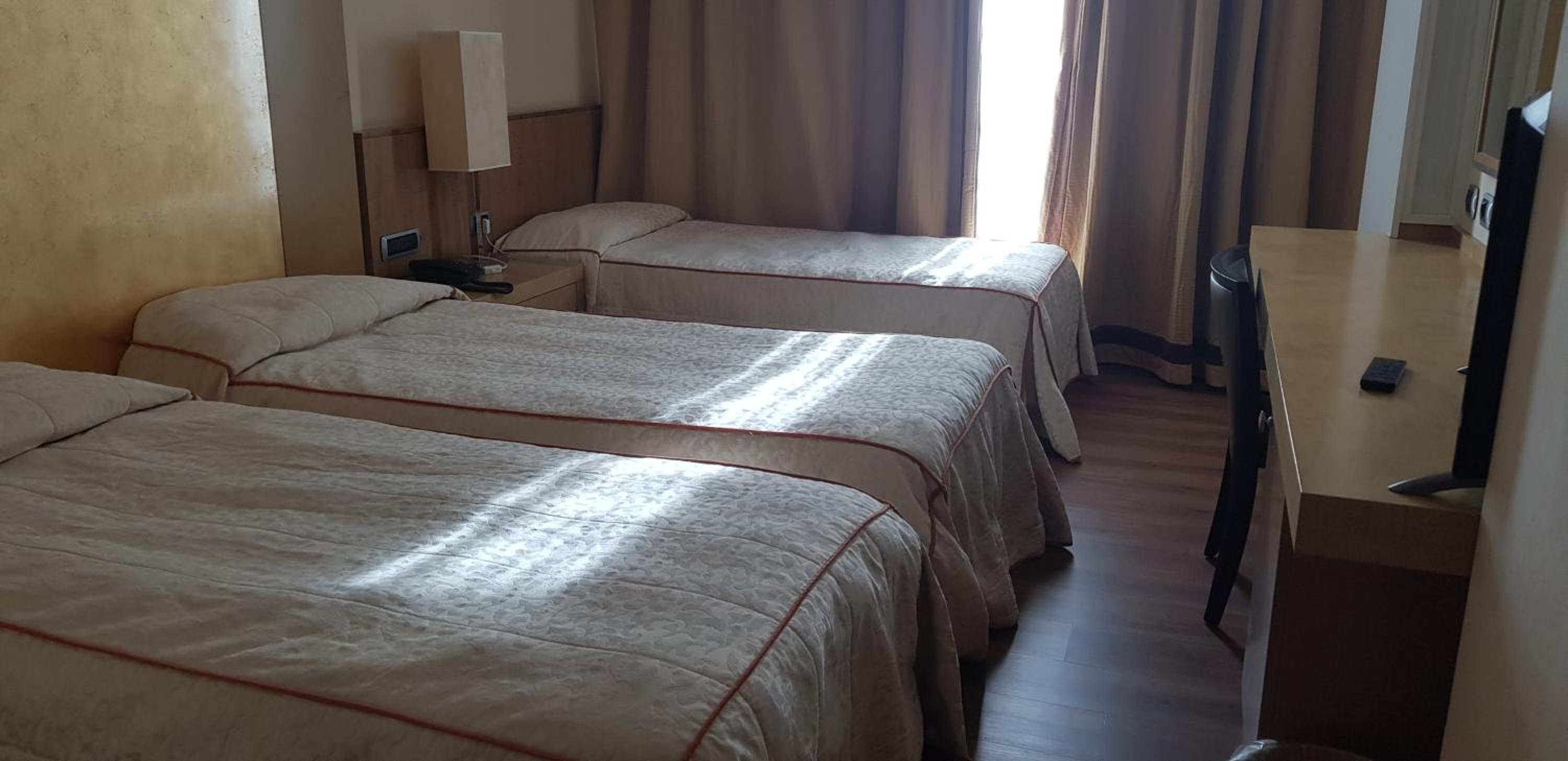 Triple Room - Photo 1