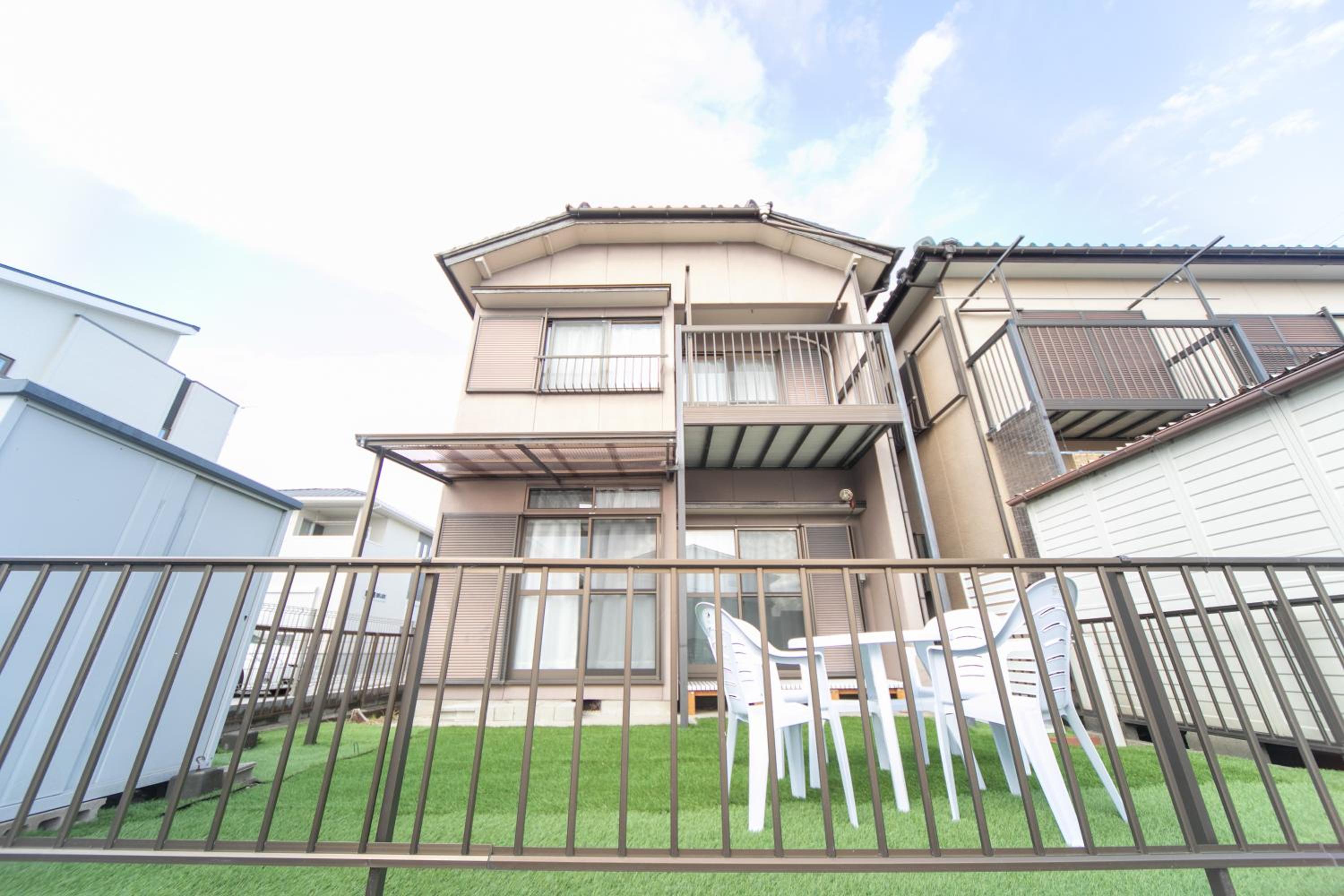 Three-Bedroom House - Photo 43