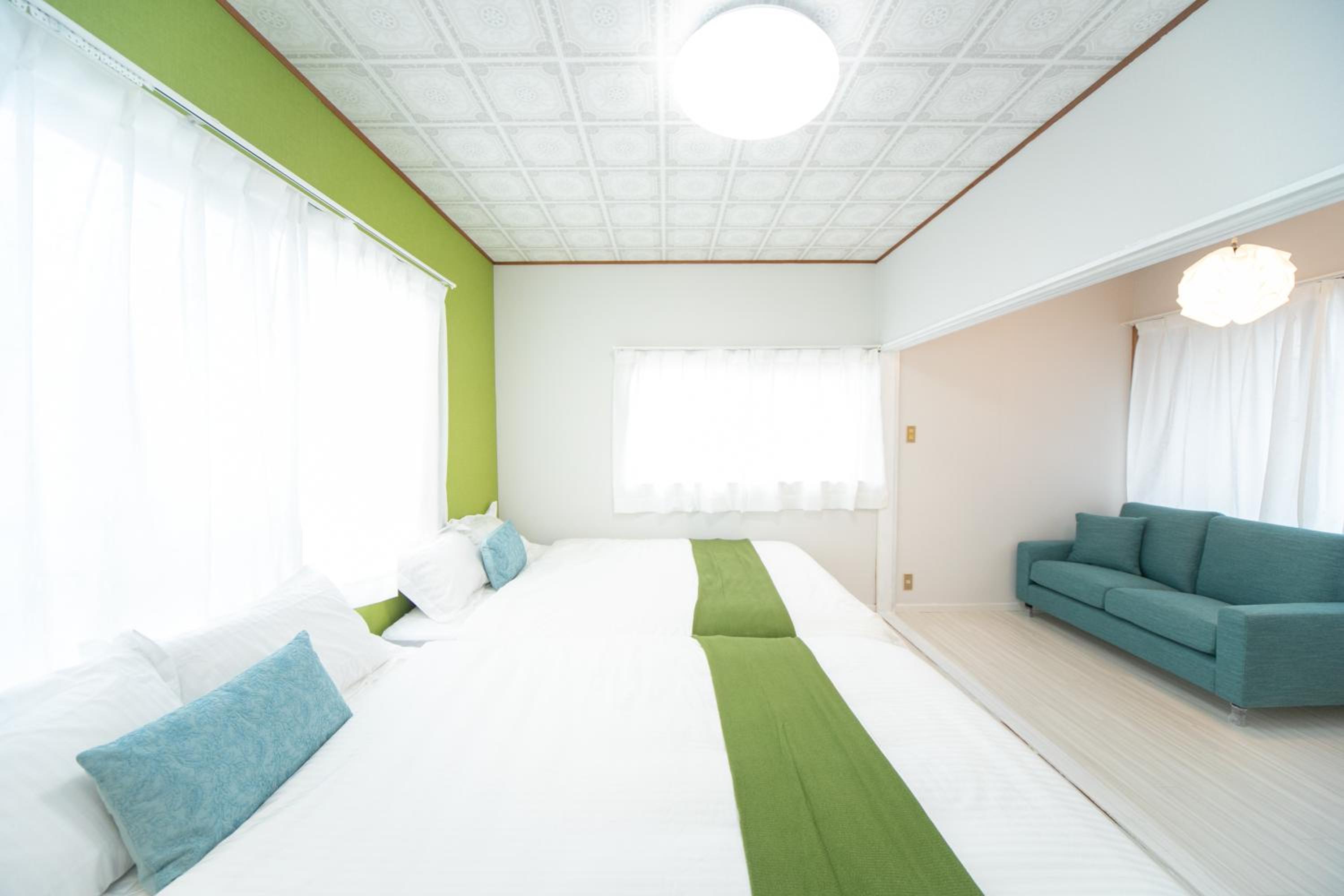 Three-Bedroom House - Photo 36