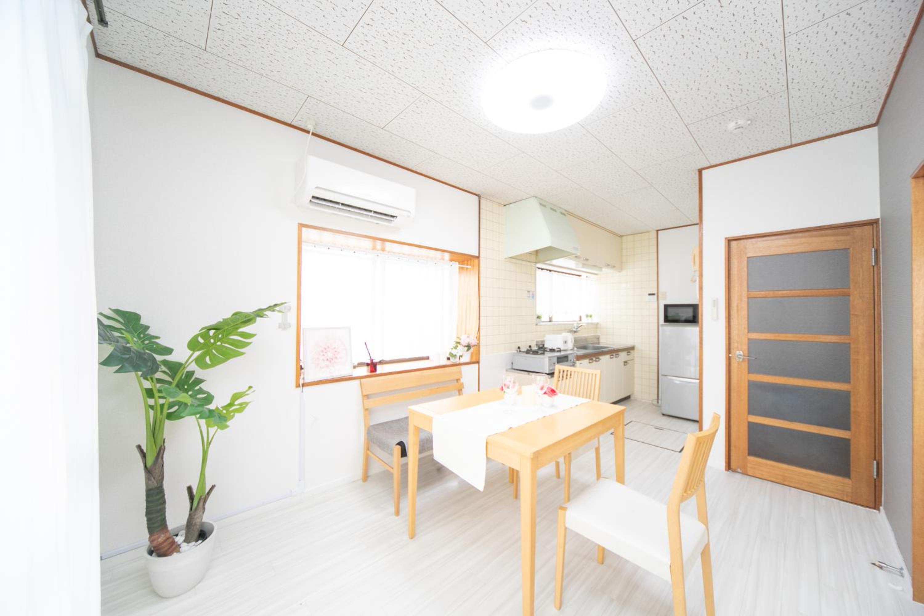 Three-Bedroom House - Photo 32