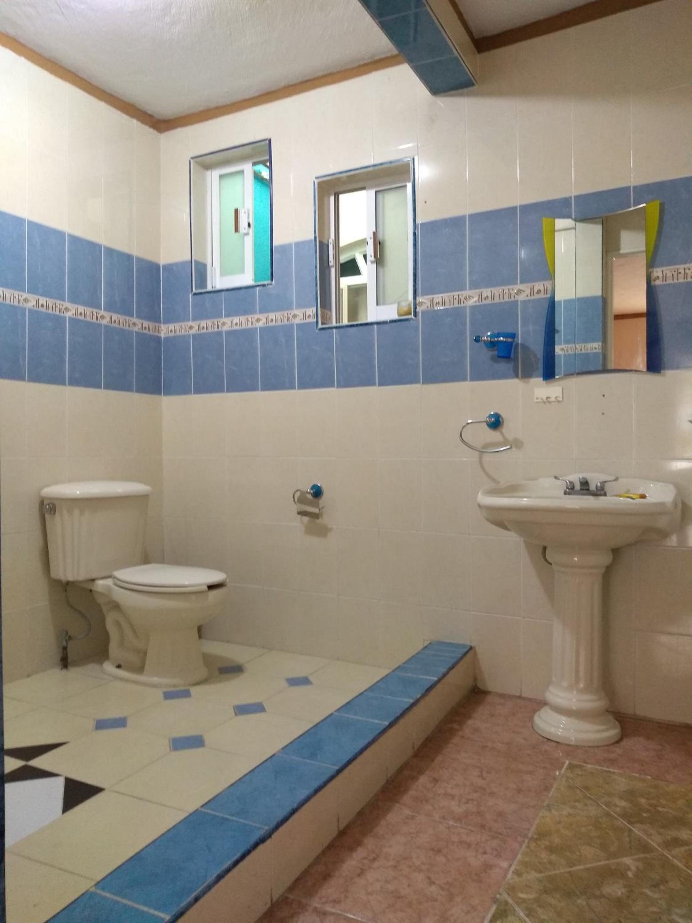 Three-Bedroom House - Photo 7