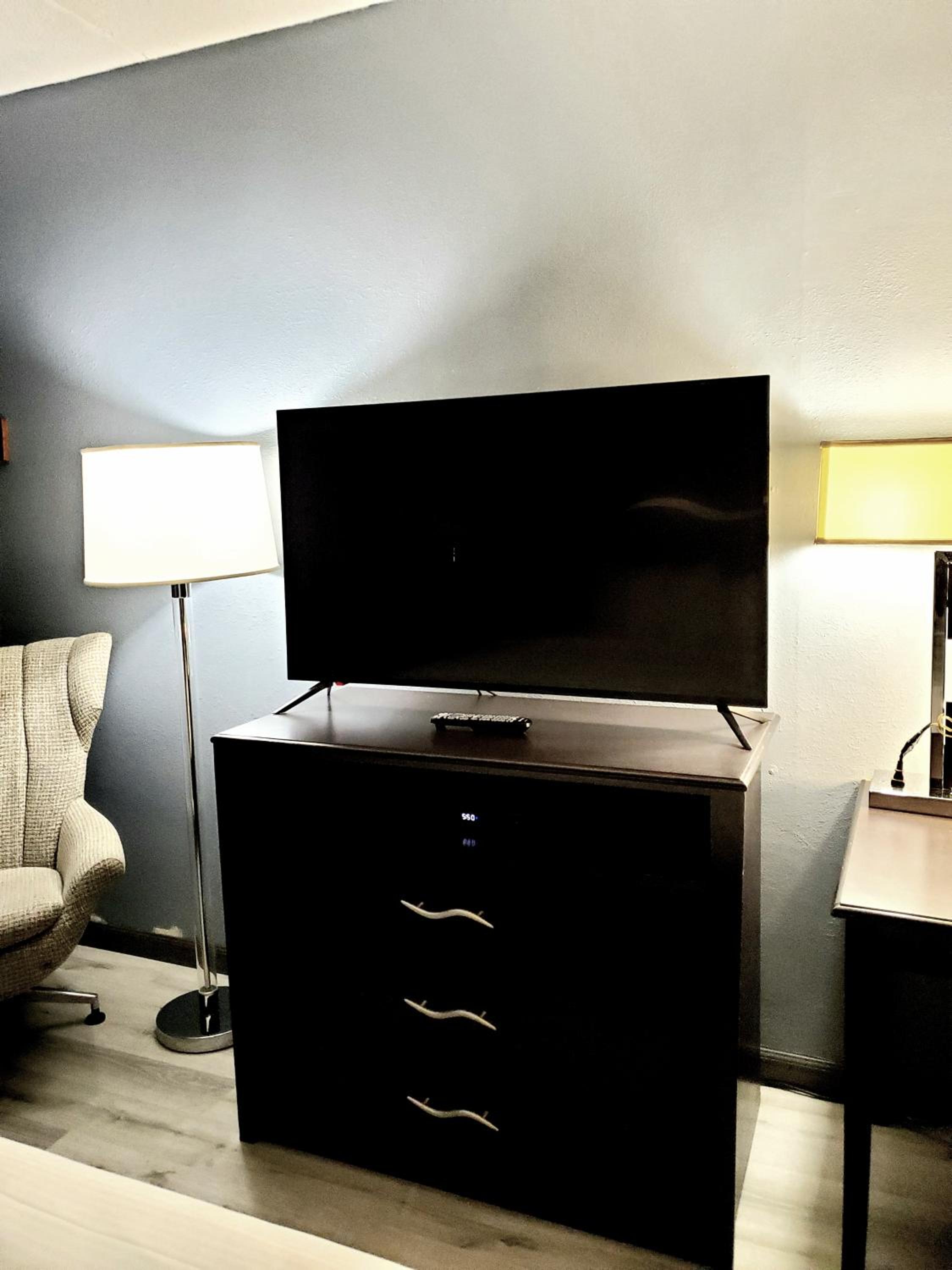flat screen tv in the corner of a living room