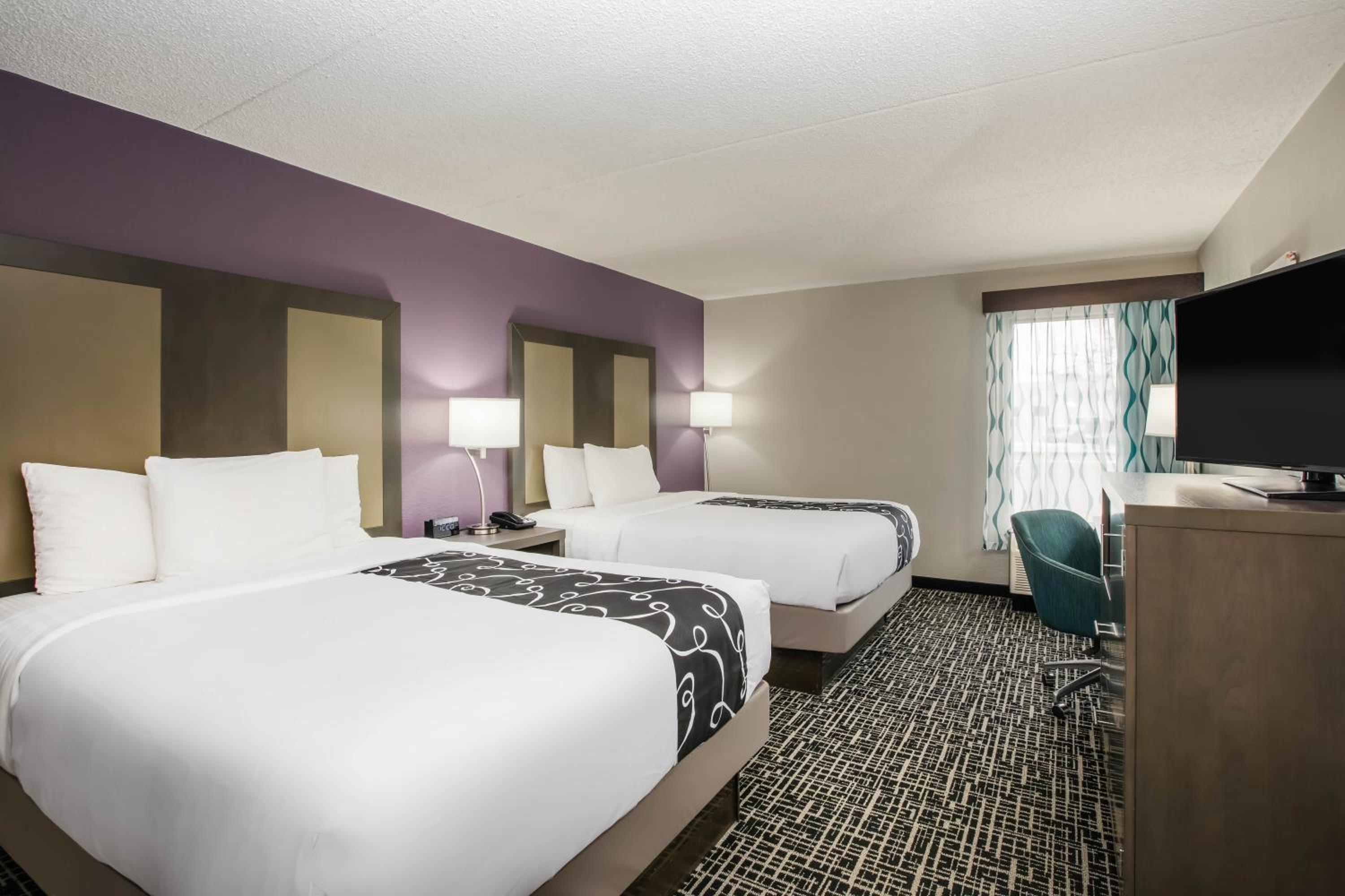 Deluxe Queen Room with Two Queen Beds - Photo 1