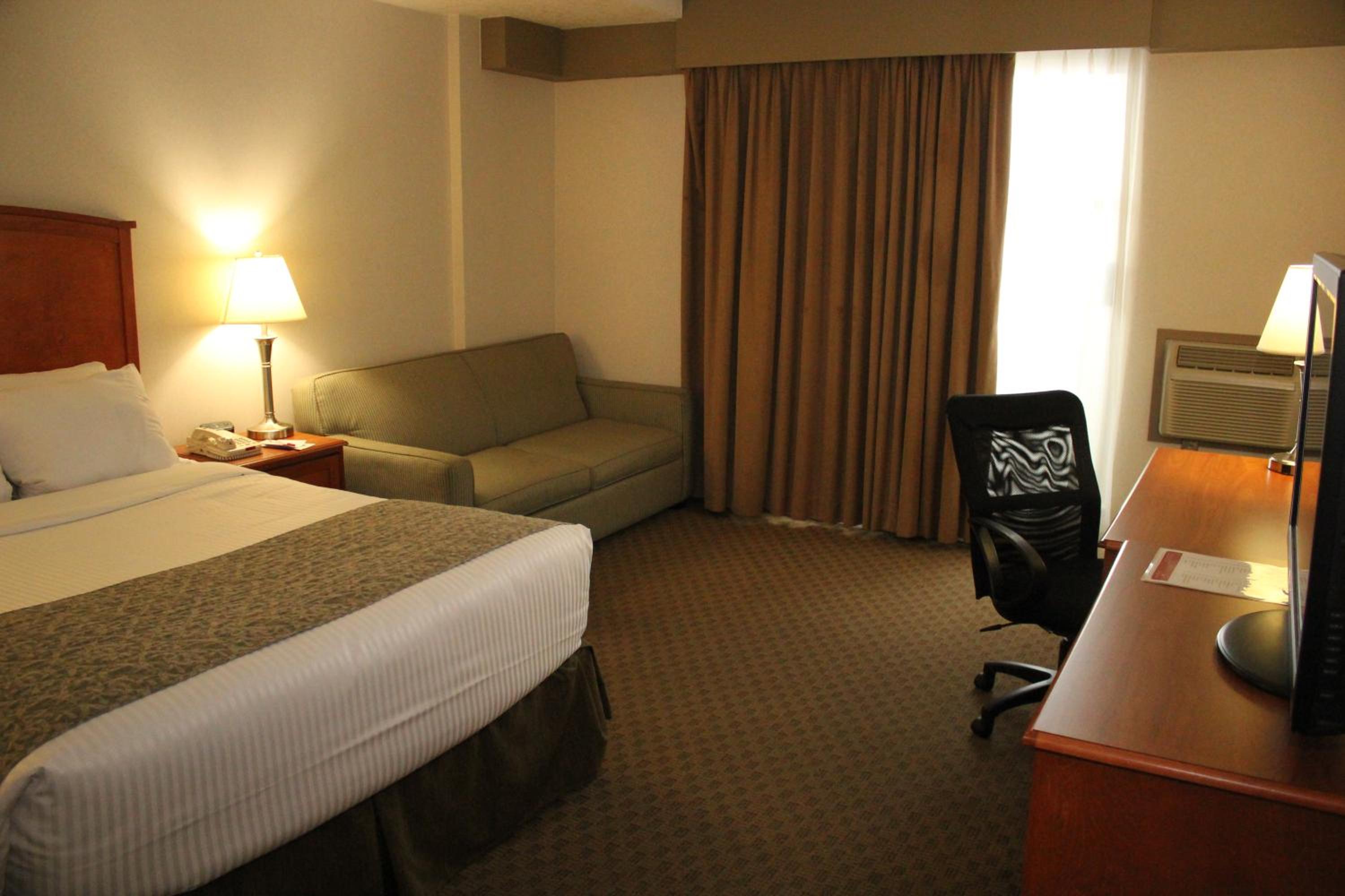 Deluxe Queen Room - Photo 7