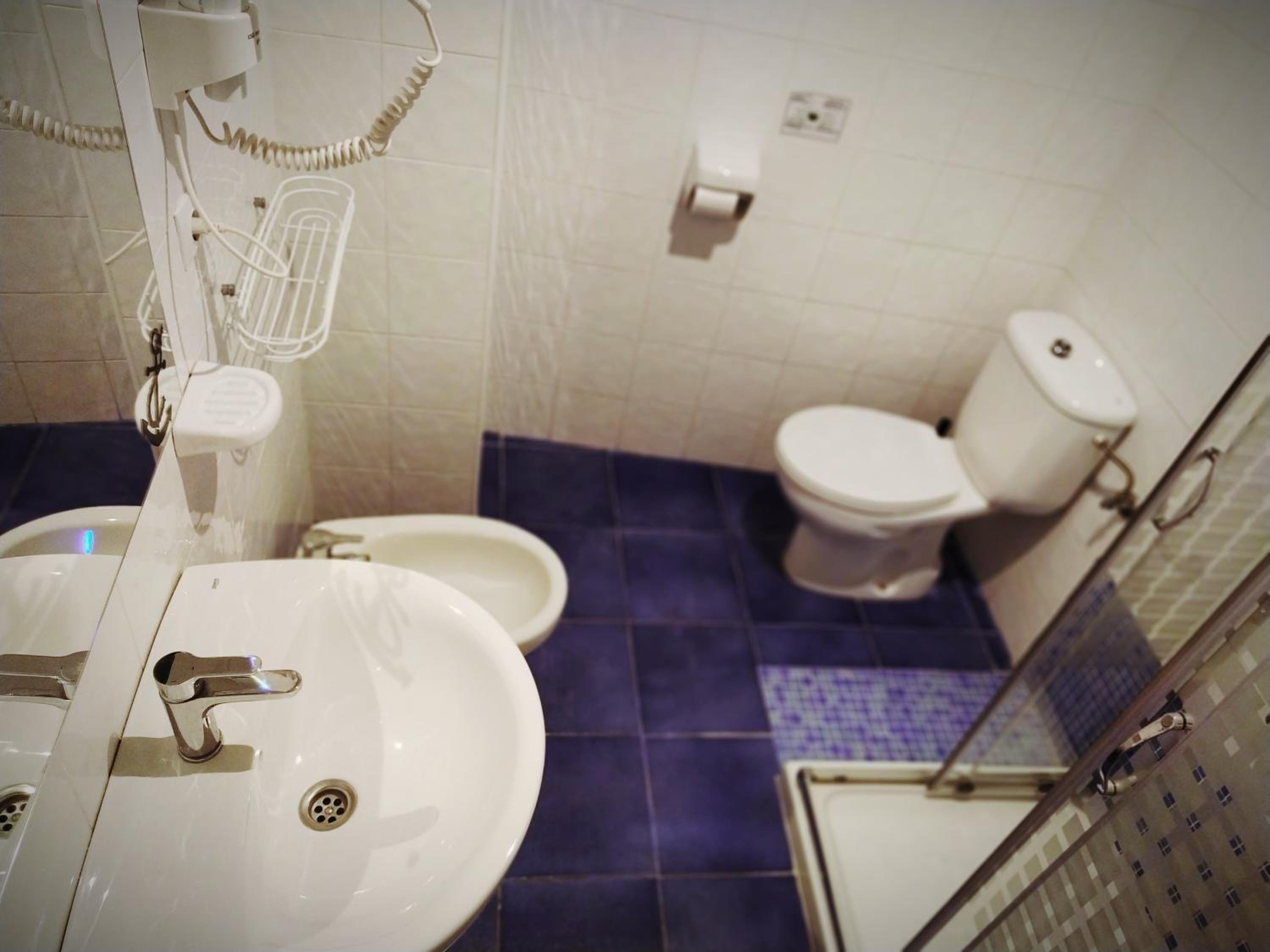 Interior Twin Room with Private Bathroom photo 3