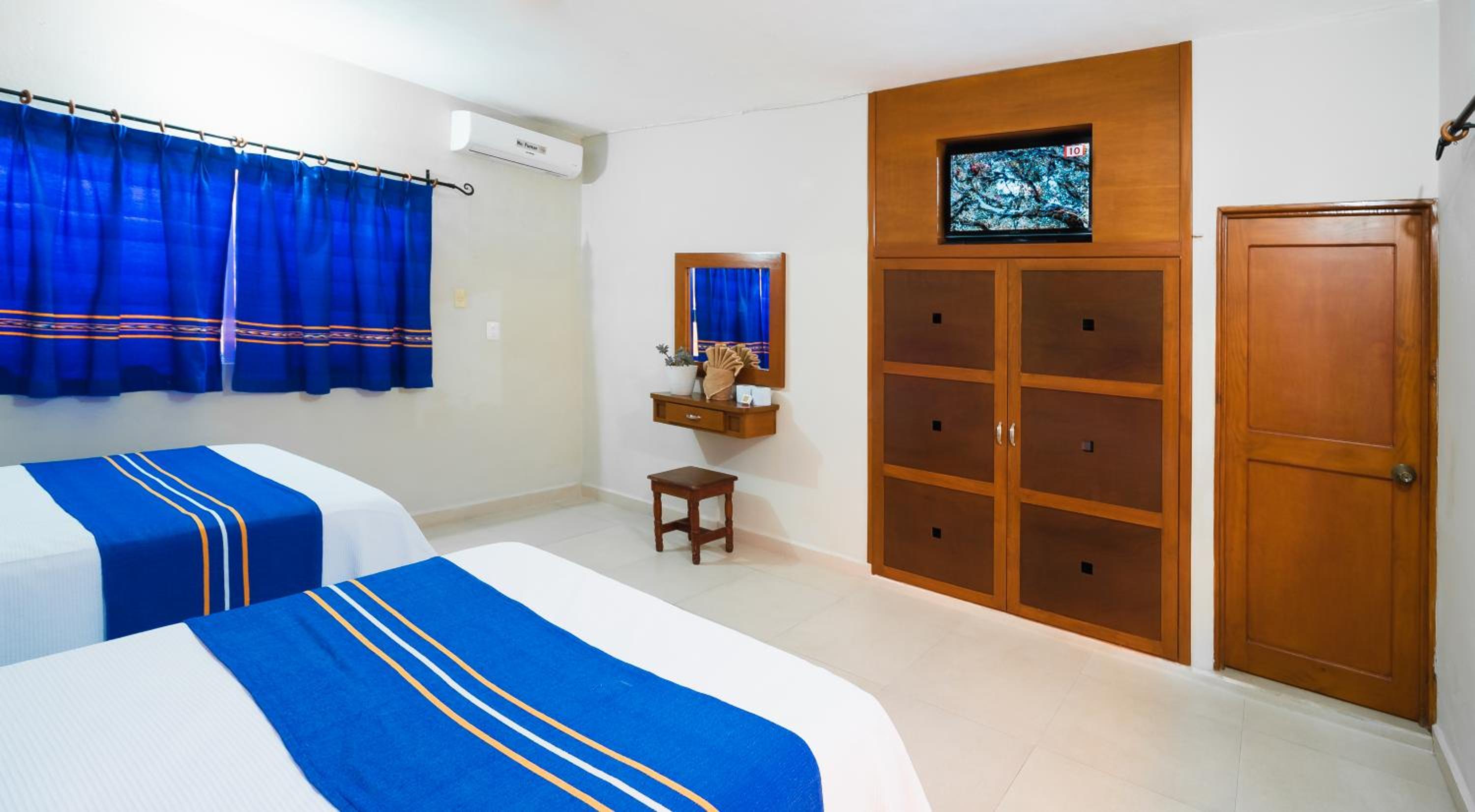 Standard Queen Room with Two Queen Beds - Photo 1