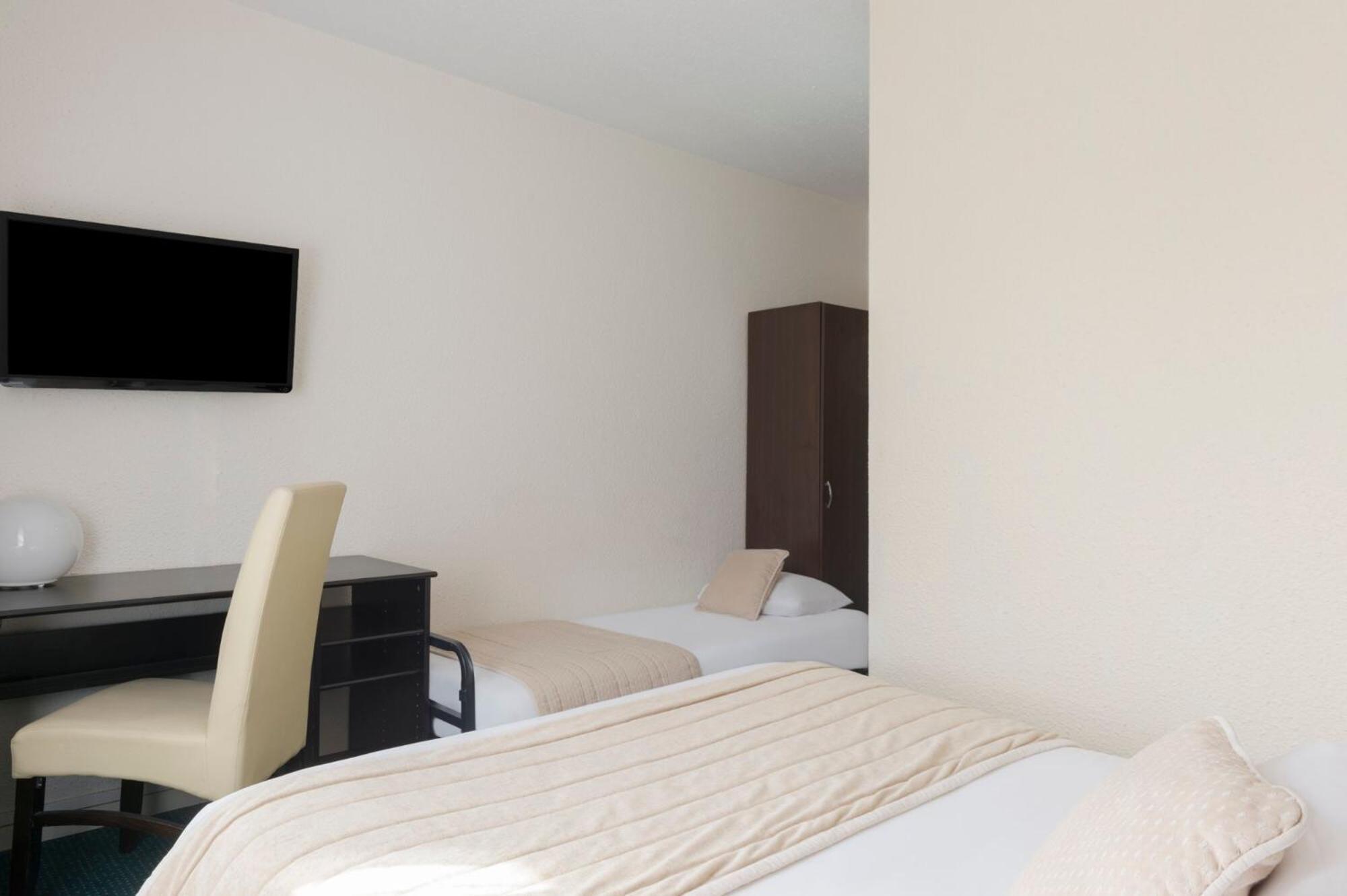 Triple Room - Photo 1