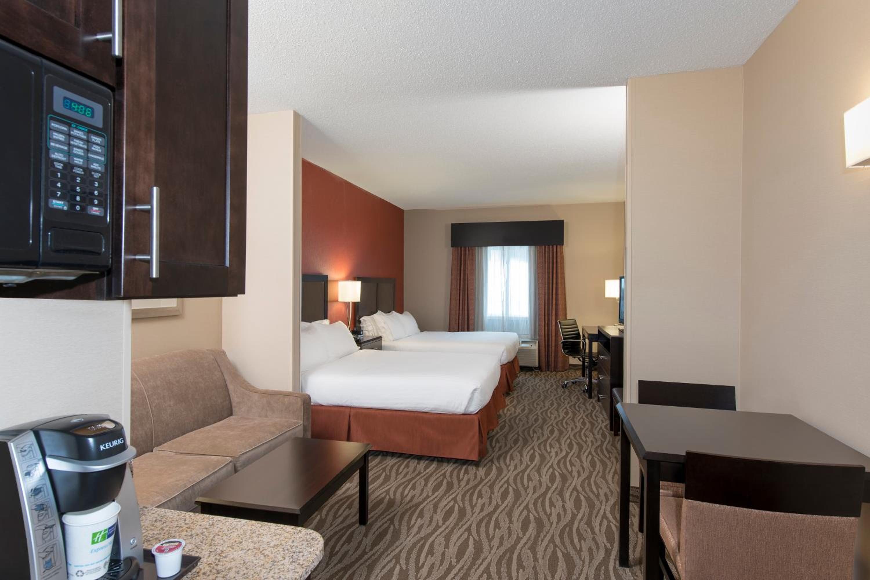 Queen Suite with Two Queen Beds and Sofa Bed - Photo 1