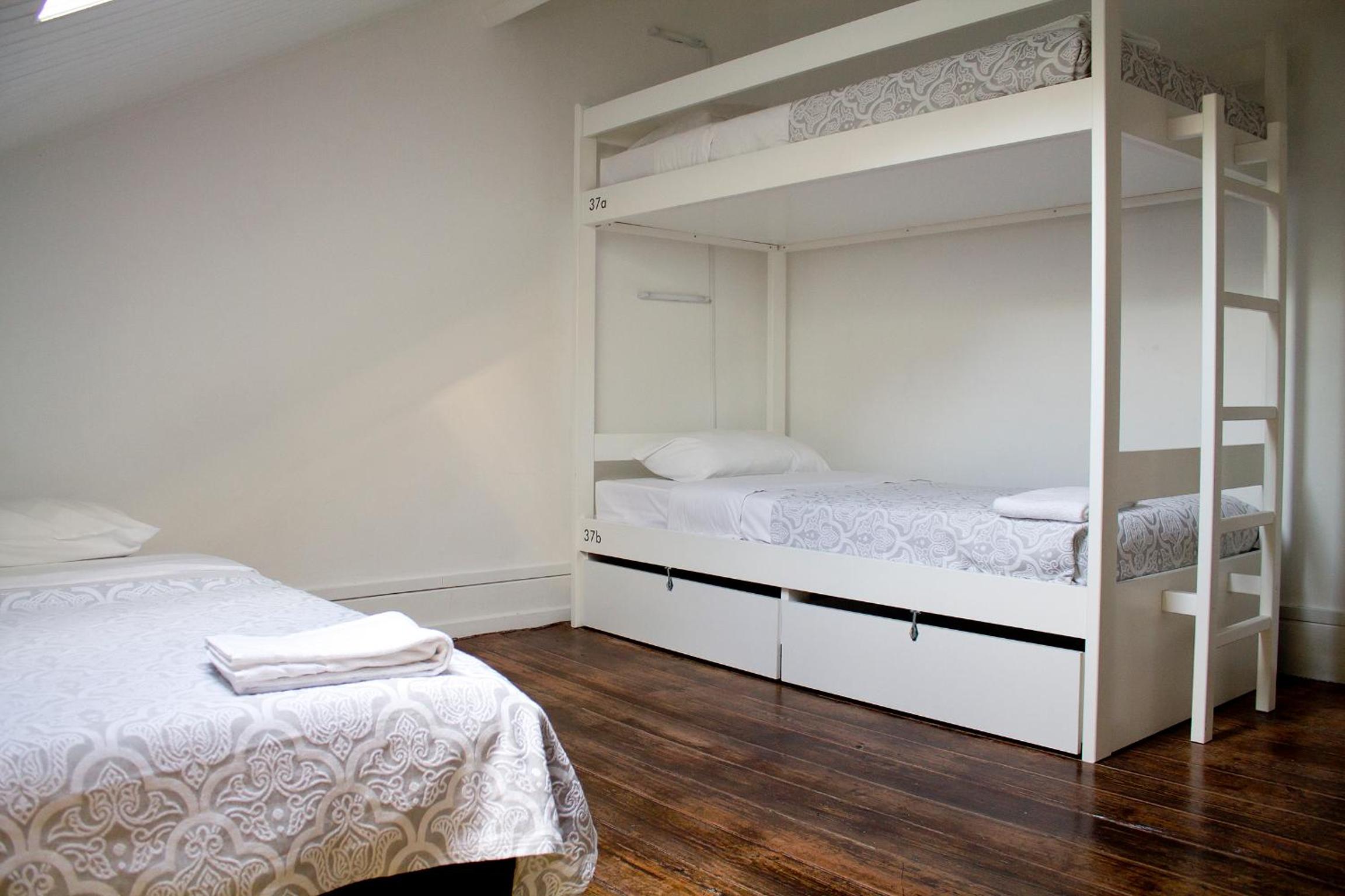 Bed in 3-Bed Dormitory Room with Shared Bathroom photo 1