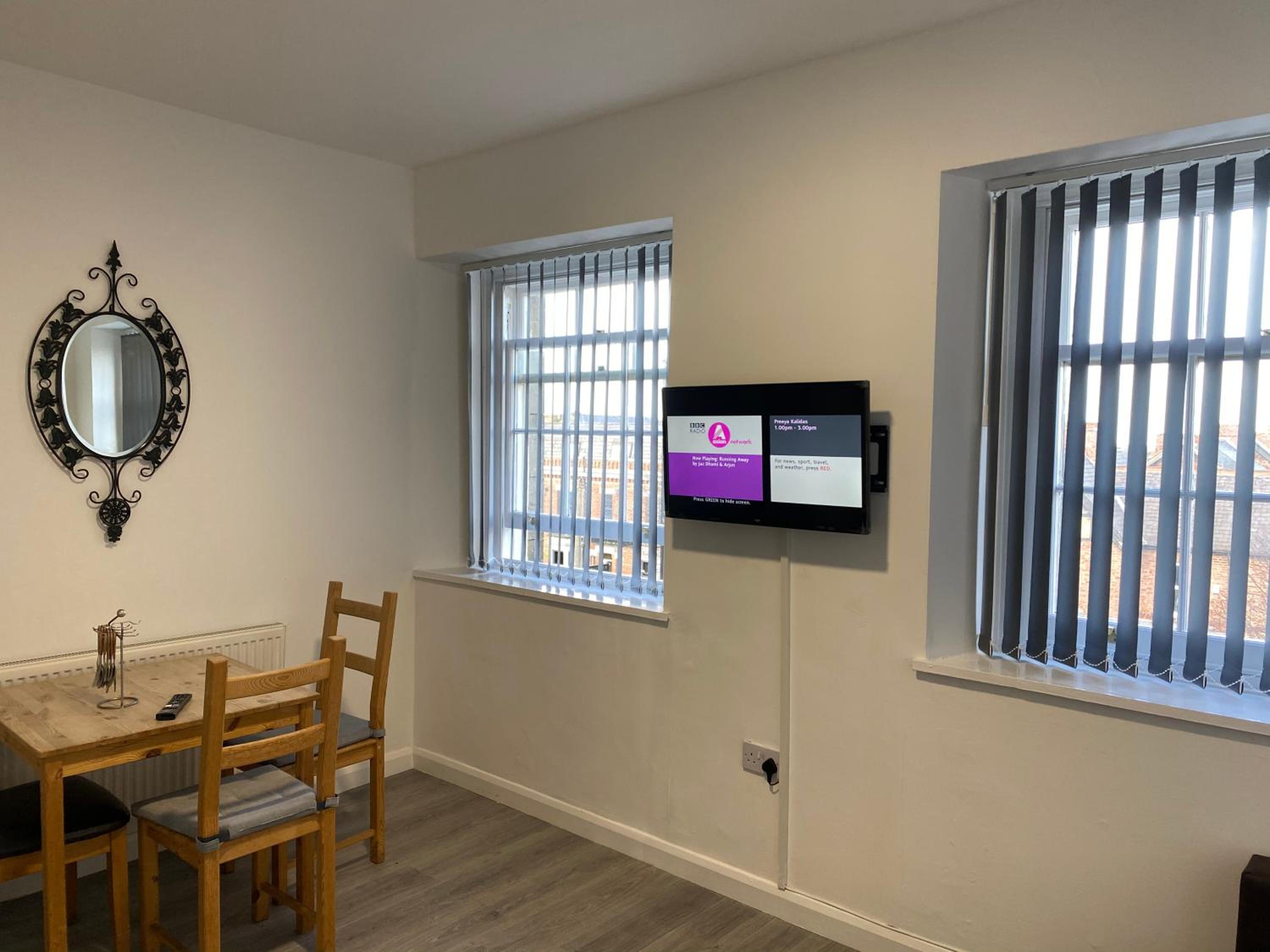 Three-Bedroom Apartment - Photo 7