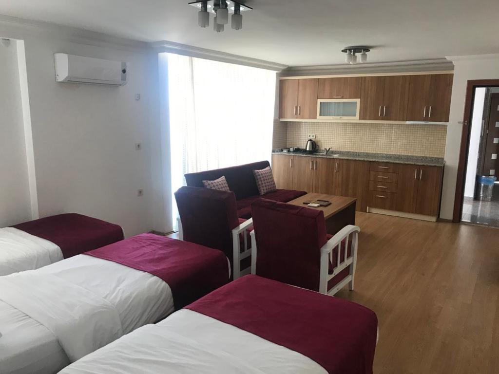 One-Bedroom Apartment (2 Adults + 2 Children)