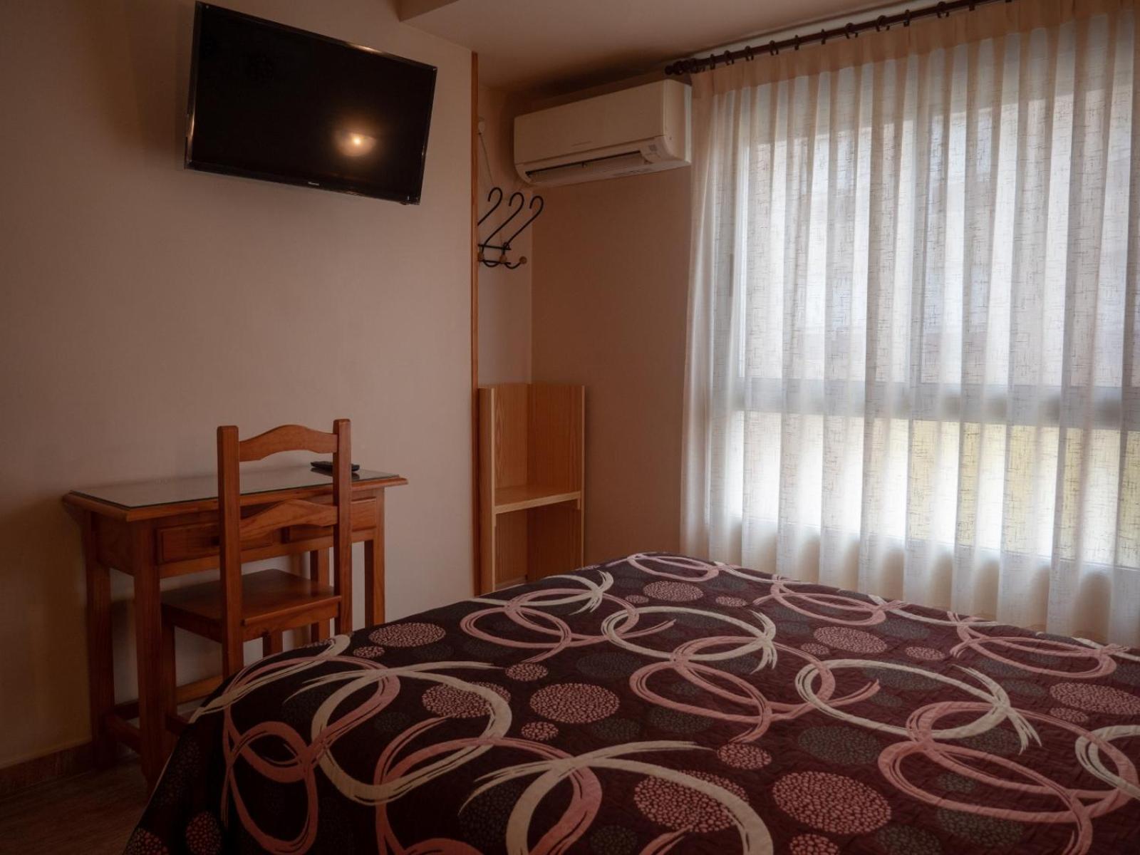 Habitación Estándar con Cama Queen