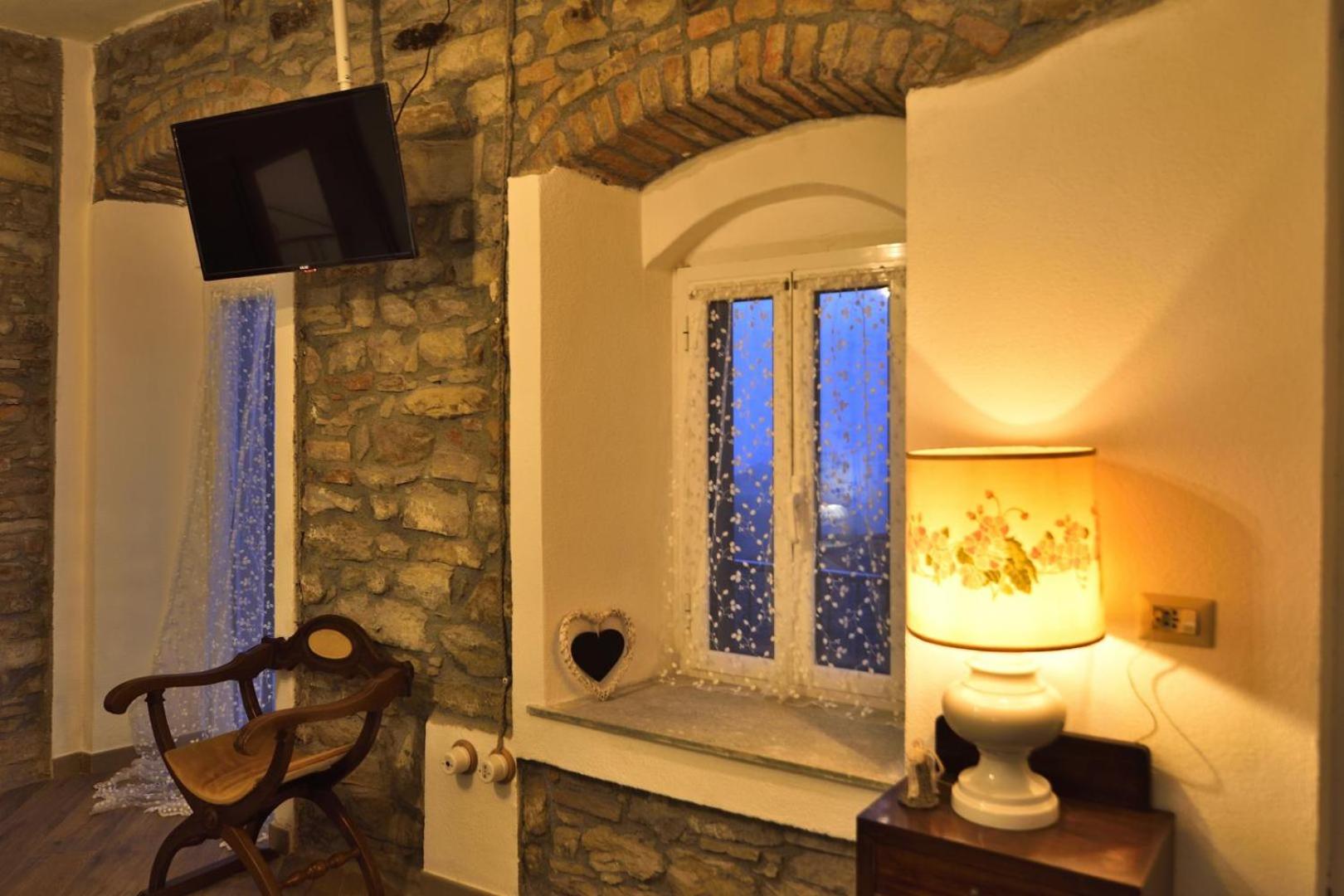 Deluxe Double Room with Balcony - Photo 19