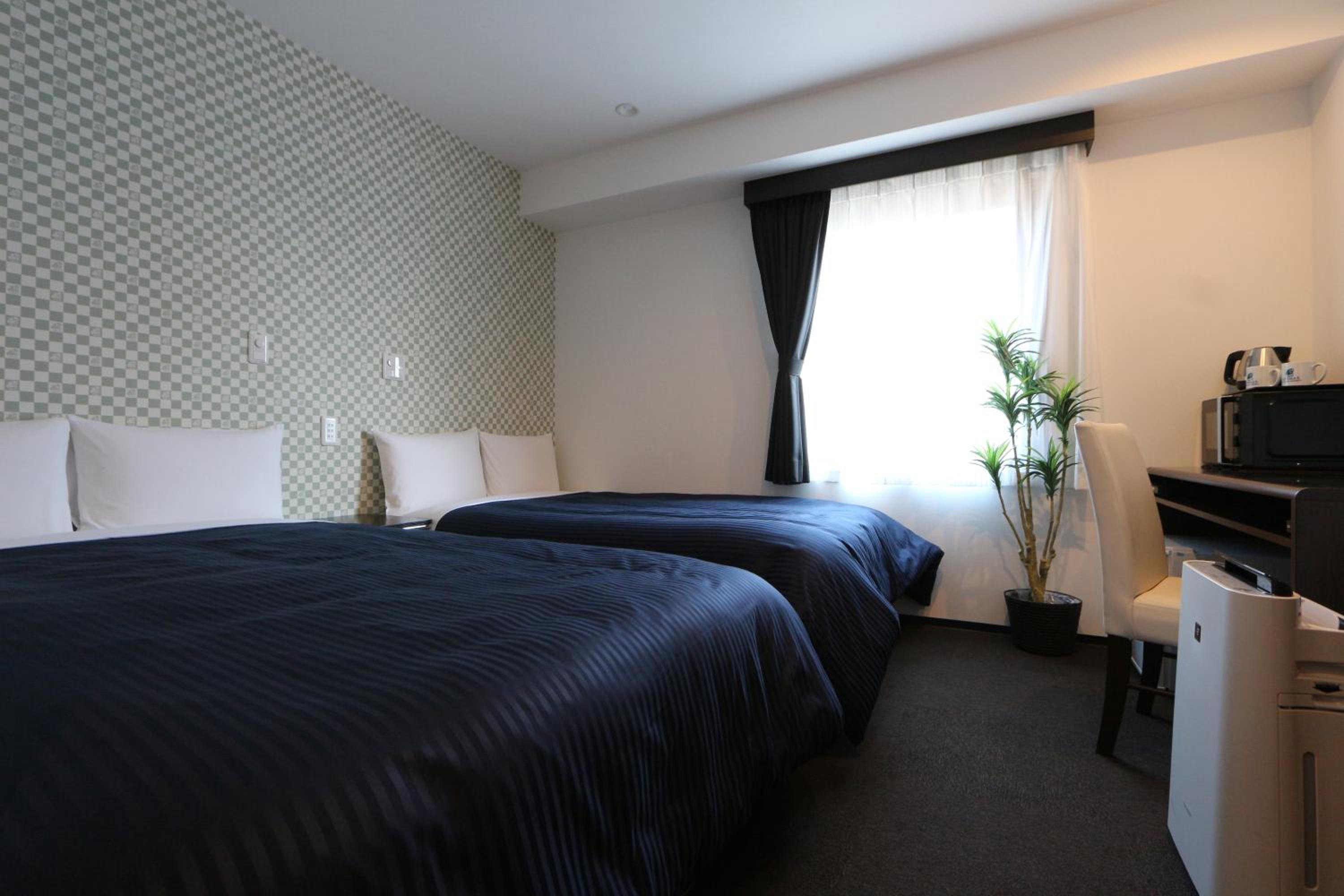 Standard Twin Room - Smoking photo 2