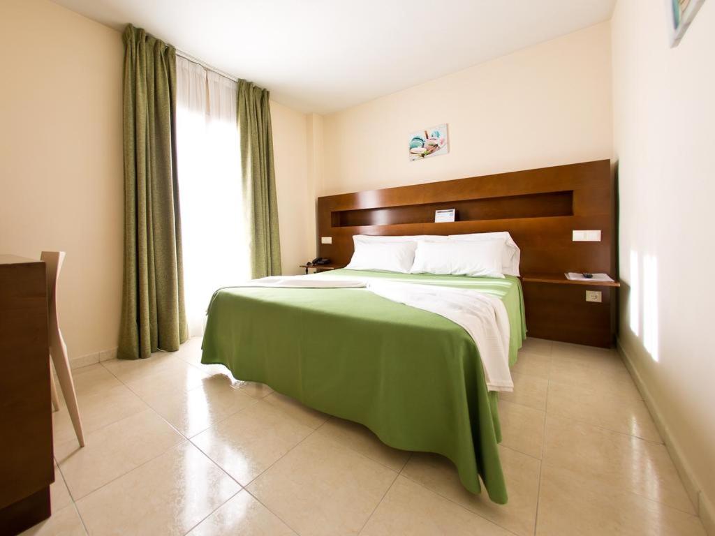 Habitación Queen con Balcón