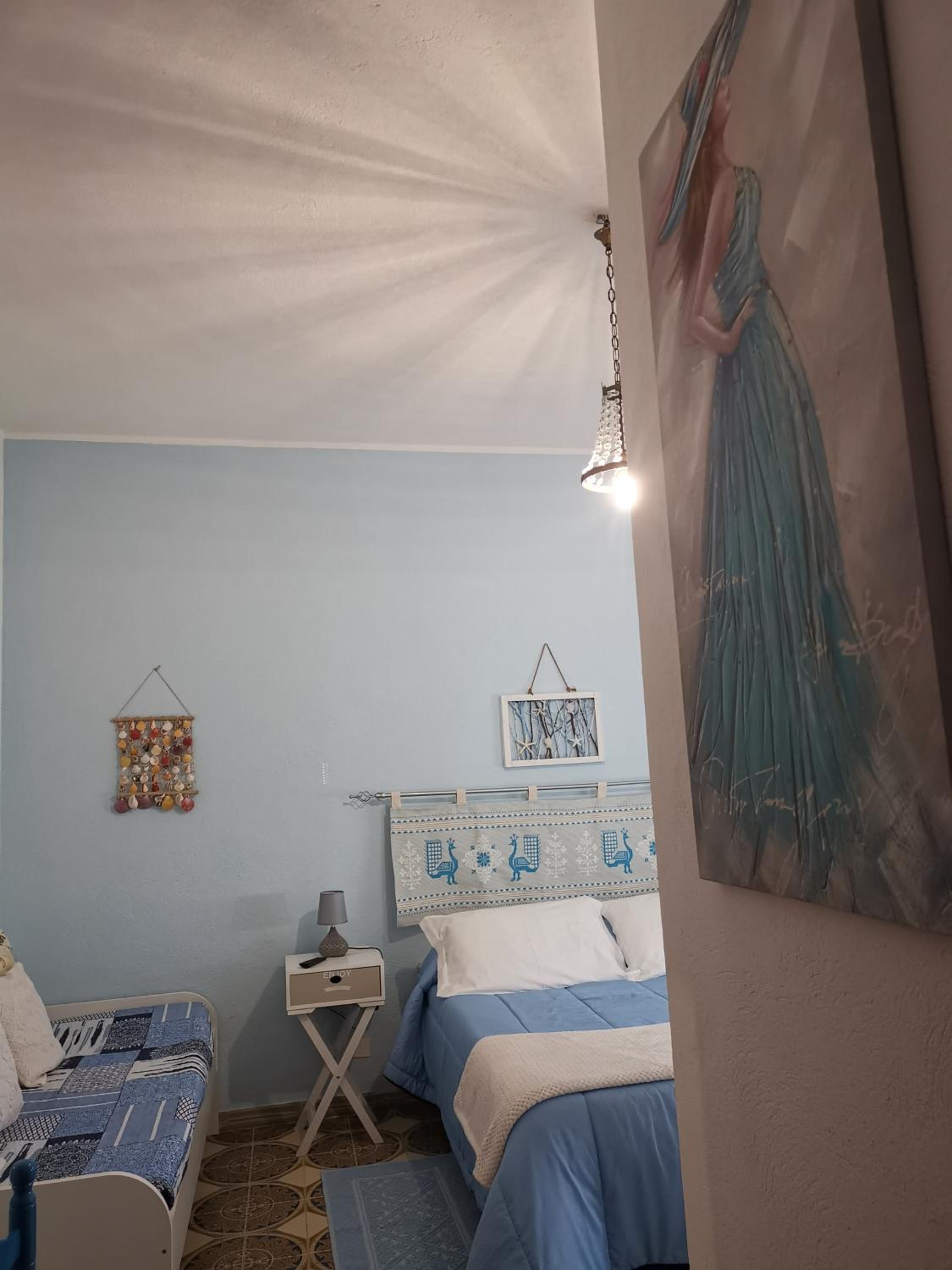 Habitación Triple con Baño Privado