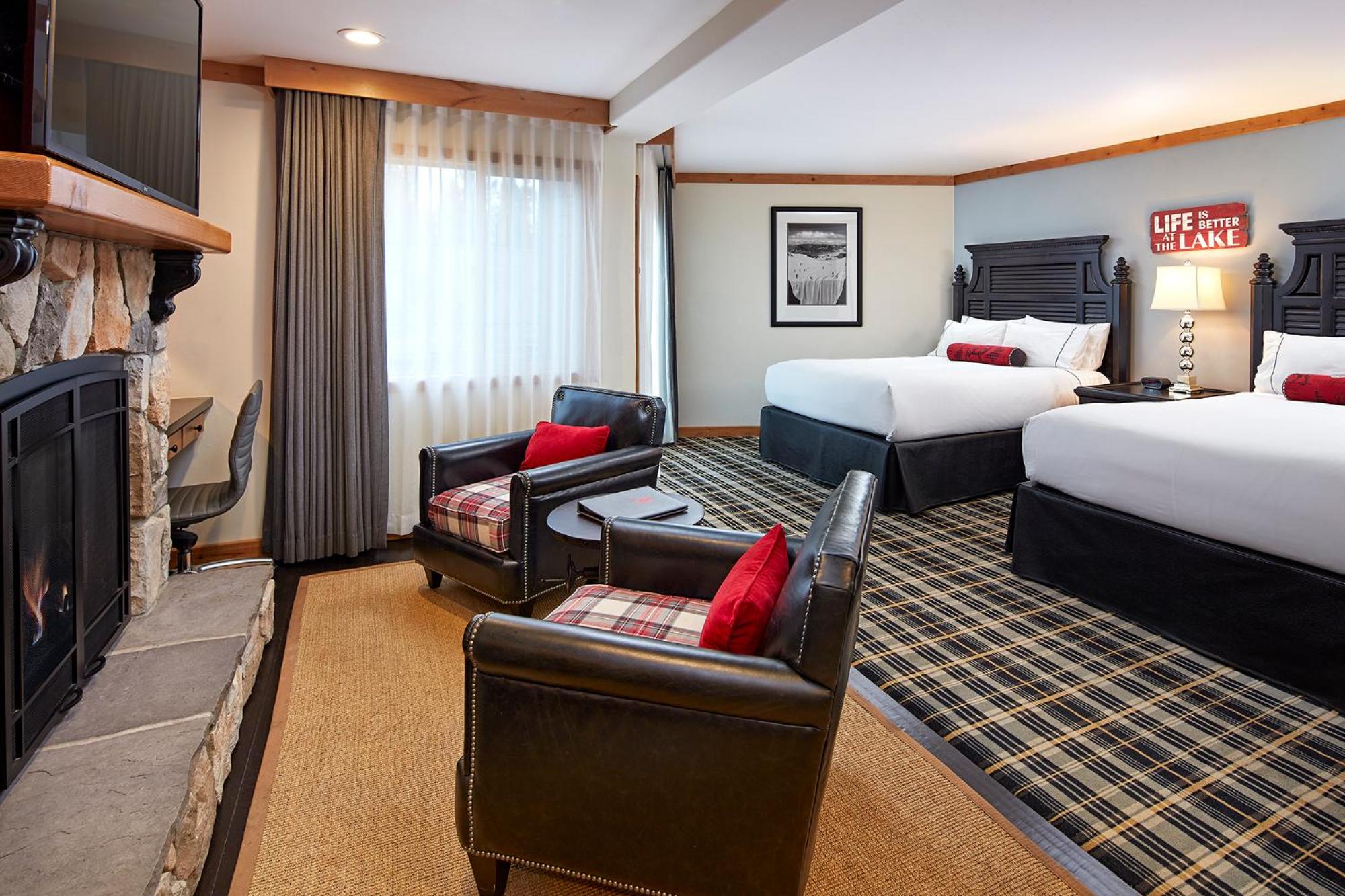 Premier Queen Room with Two Queen Beds - Photo 1