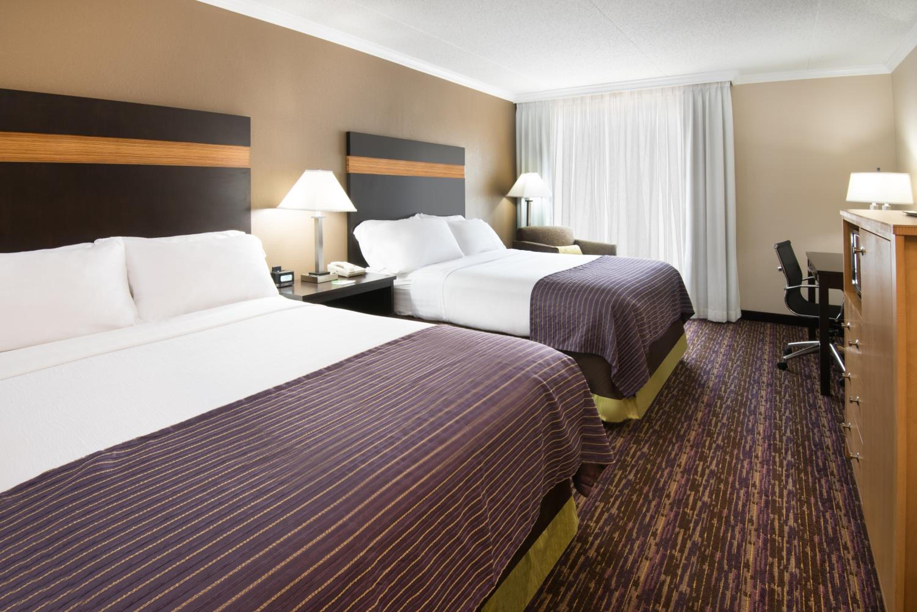 Standard Queen Room with Two Queen Beds - Photo 1