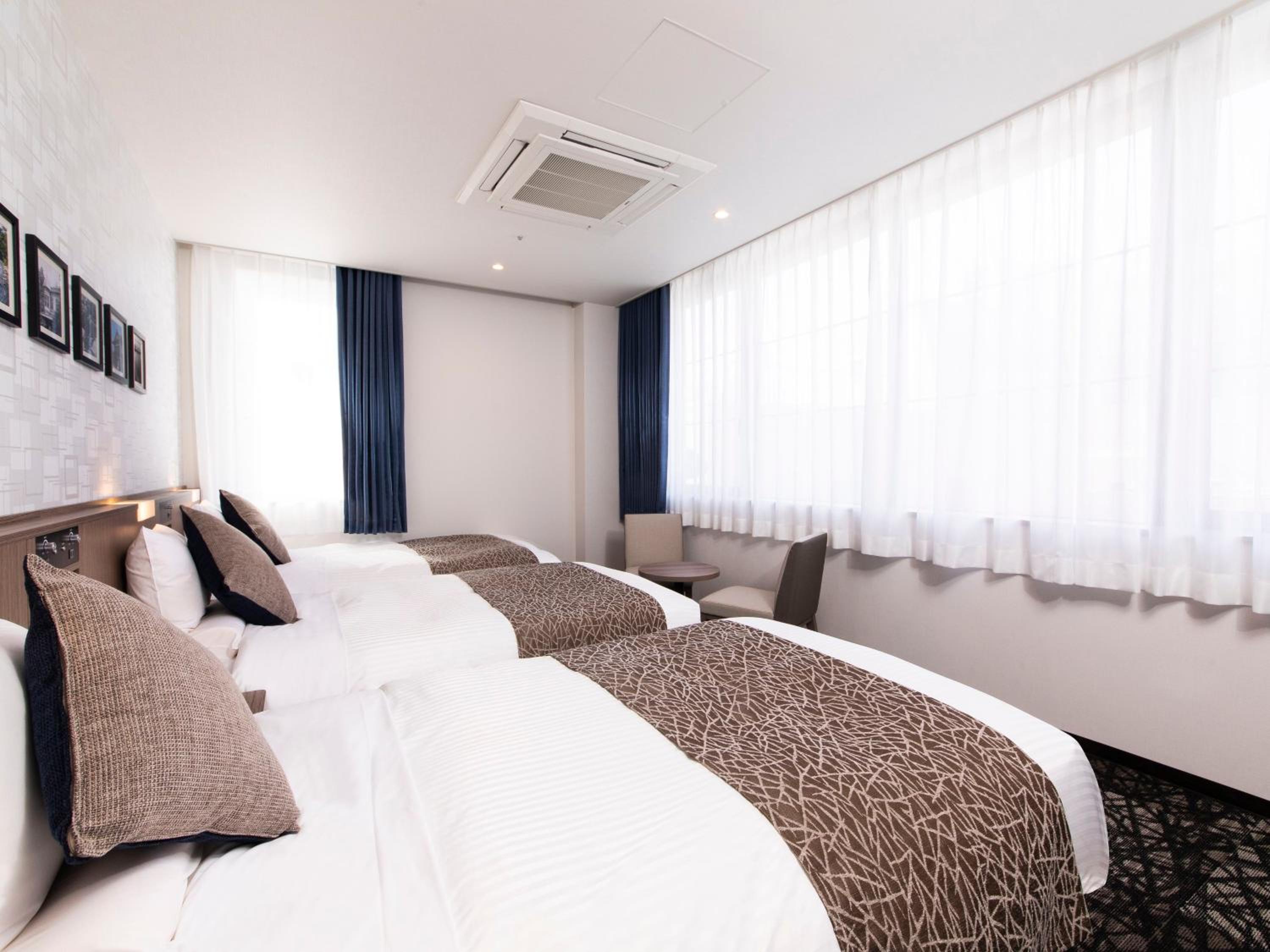 Standard Triple Room - Photo 1