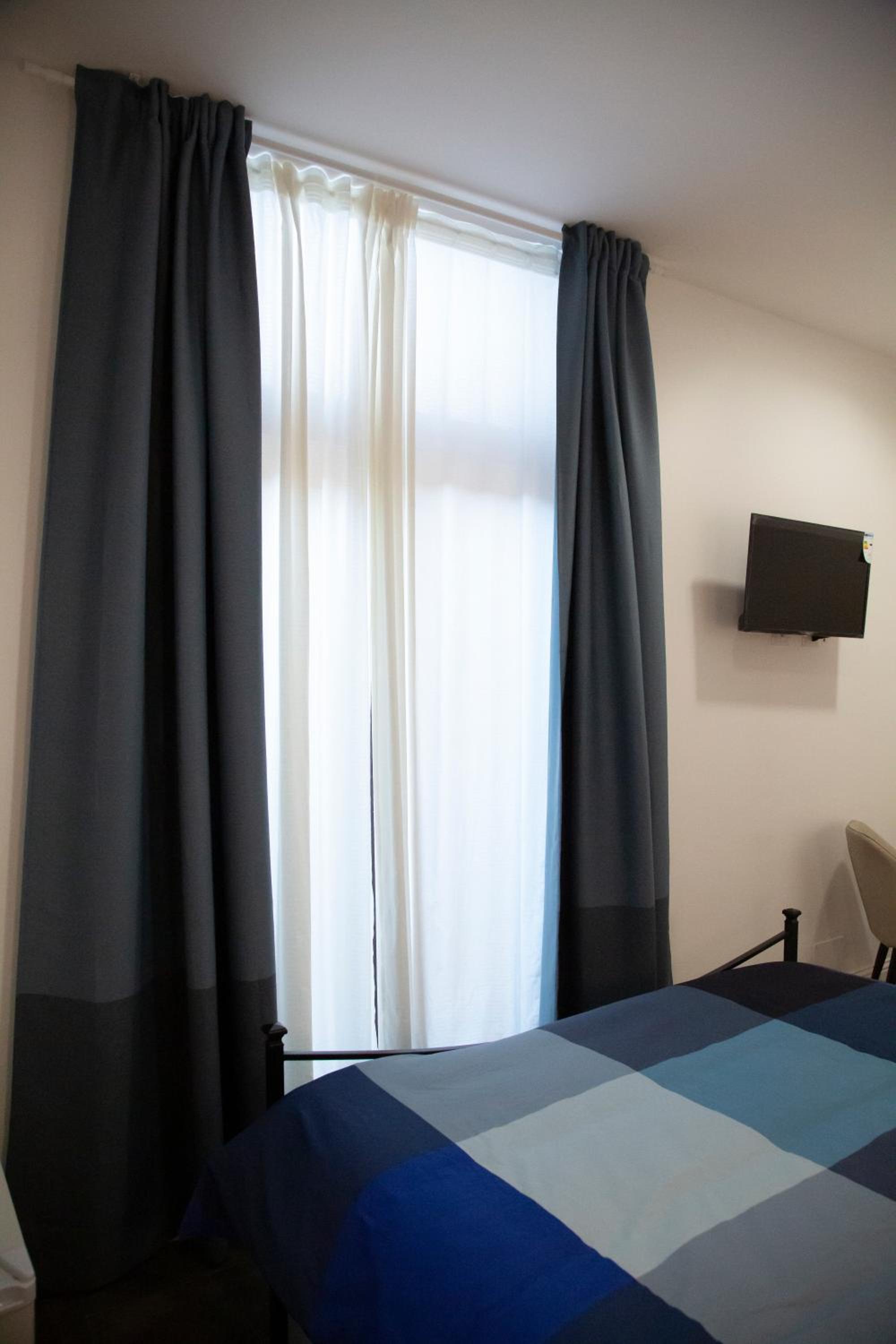 Deluxe Double Room with Balcony - Photo 18