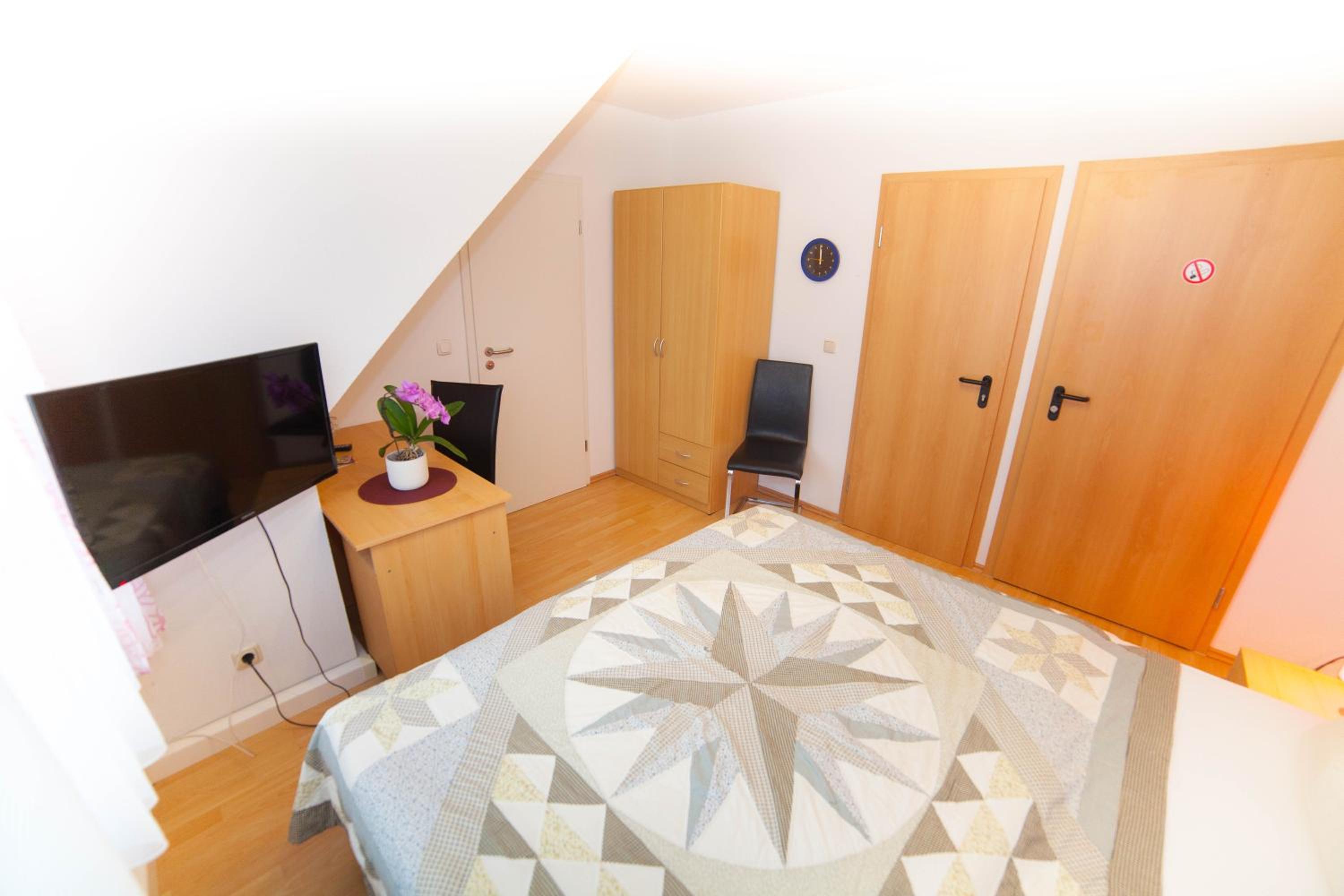 Two-Bedroom Apartment - Photo 17