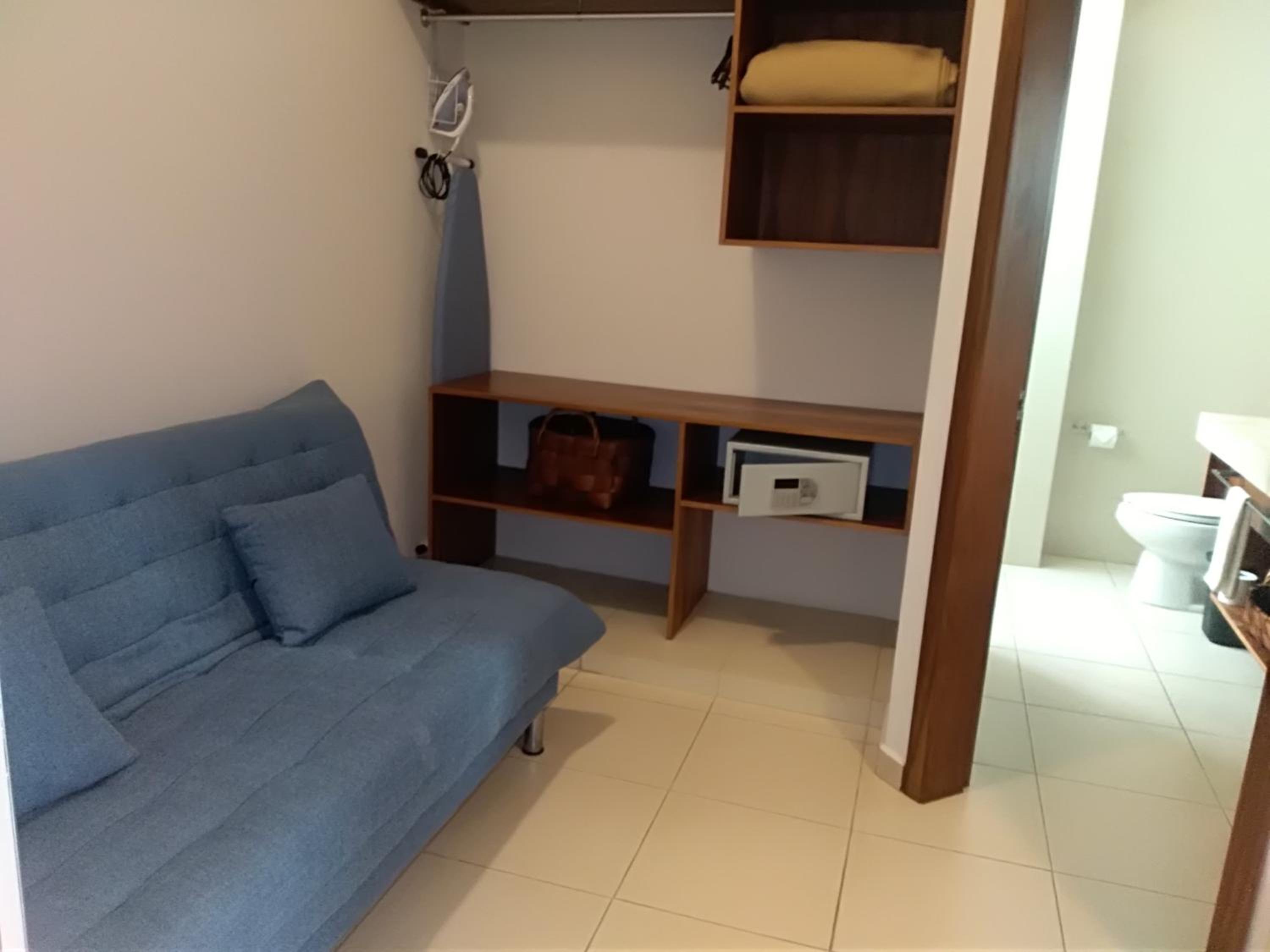 Deluxe King Room with Sofa Bed photo 3