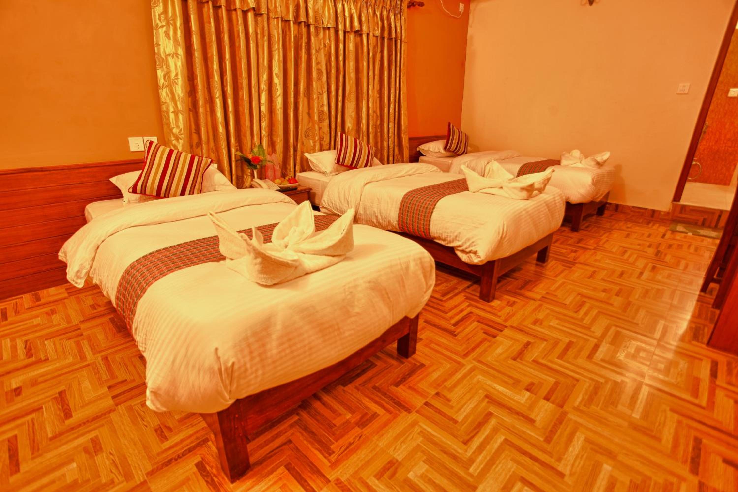Deluxe Triple Room - Photo 1