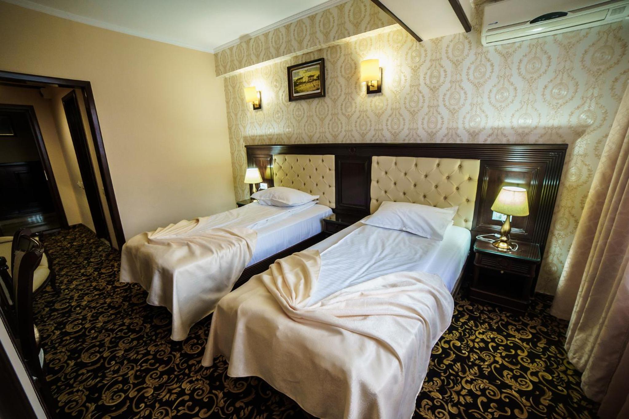Twin Room - Photo 1
