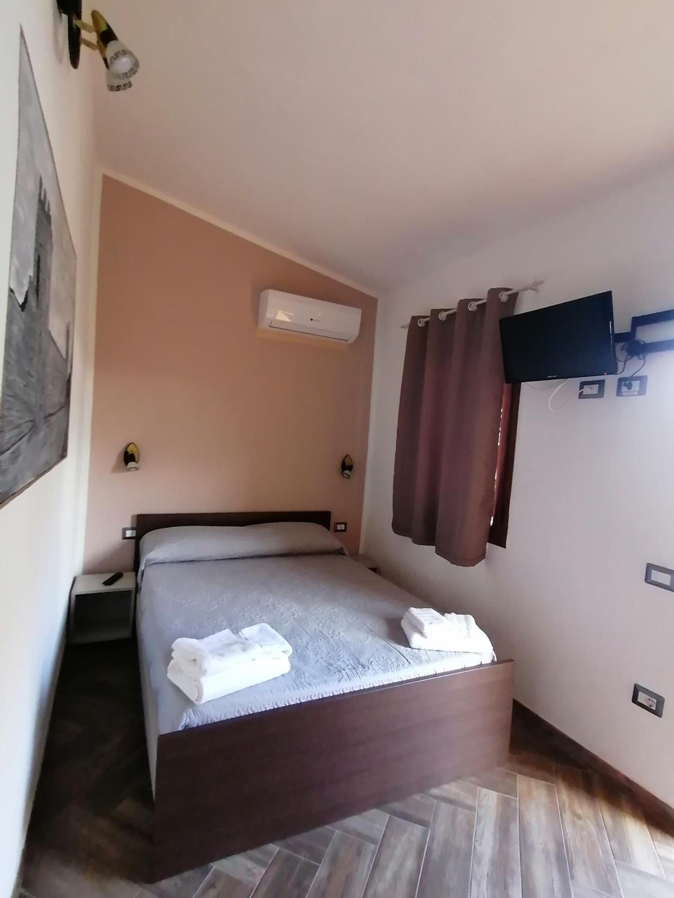 Quadruple Room with Private Bathroom