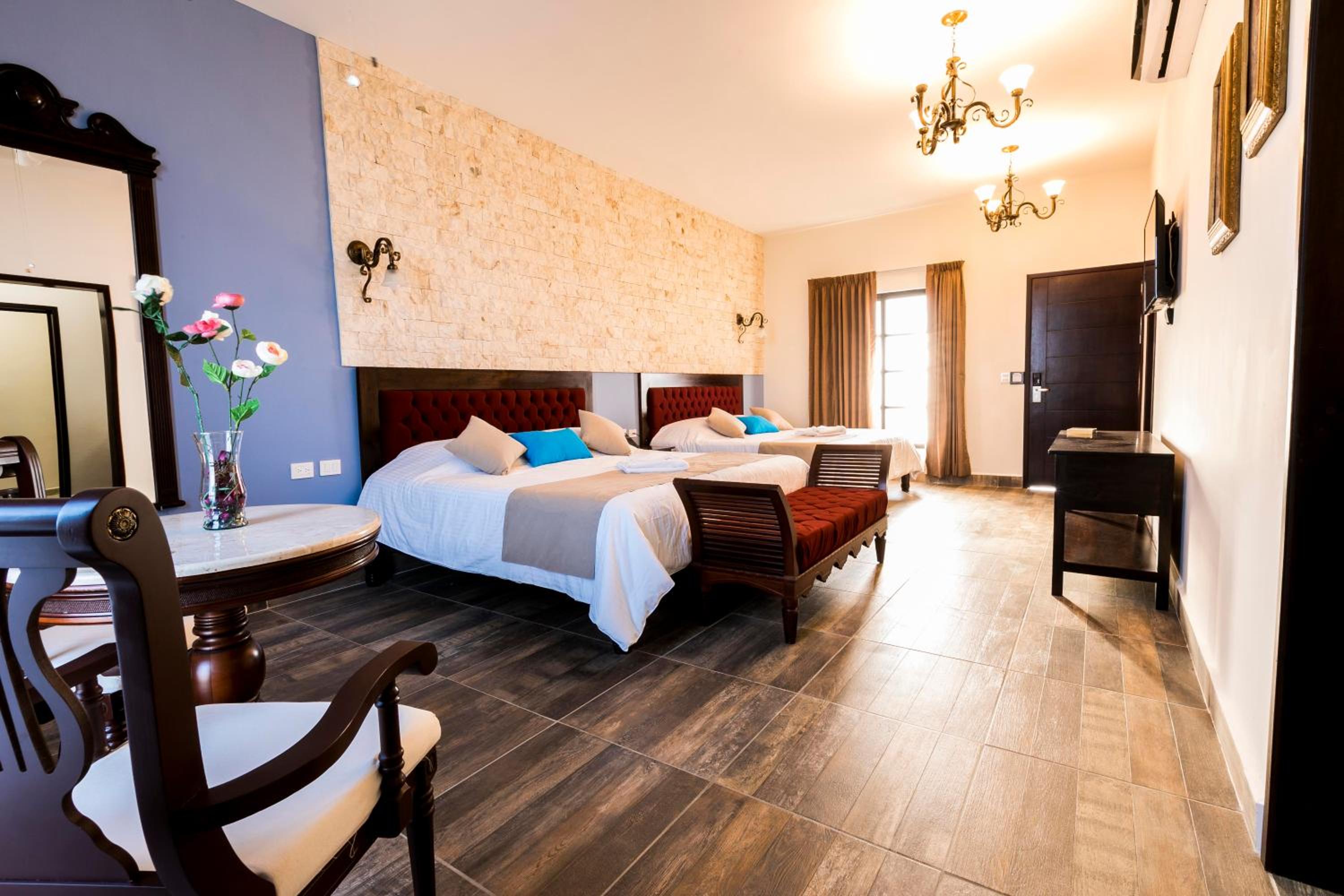 Master Suite 2 king size beds, living room, pool and garden view