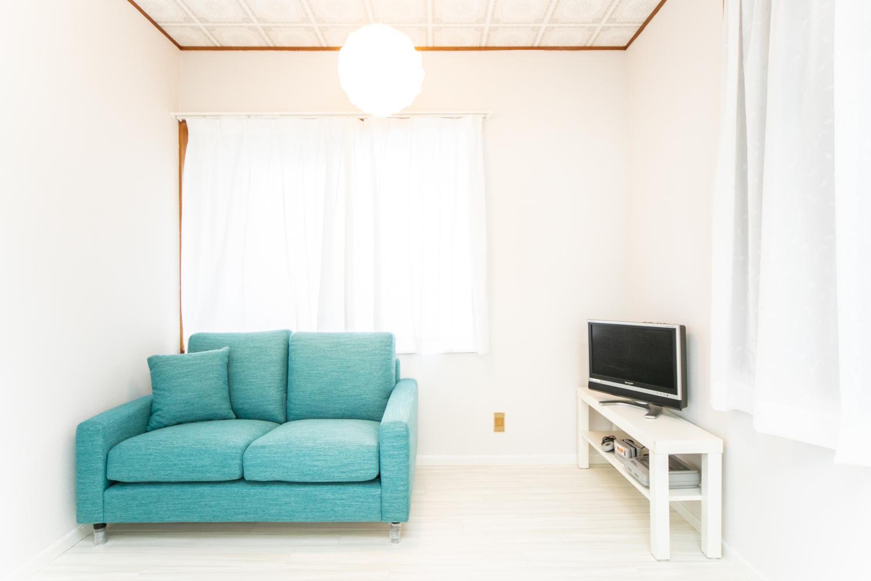 Three-Bedroom House - Photo 30