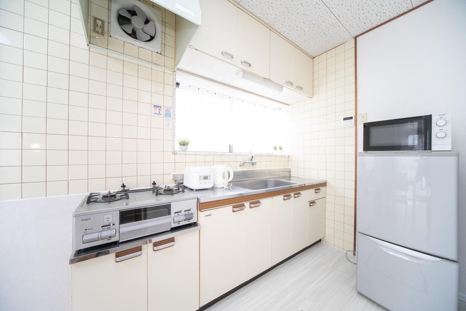 Three-Bedroom House - Photo 24