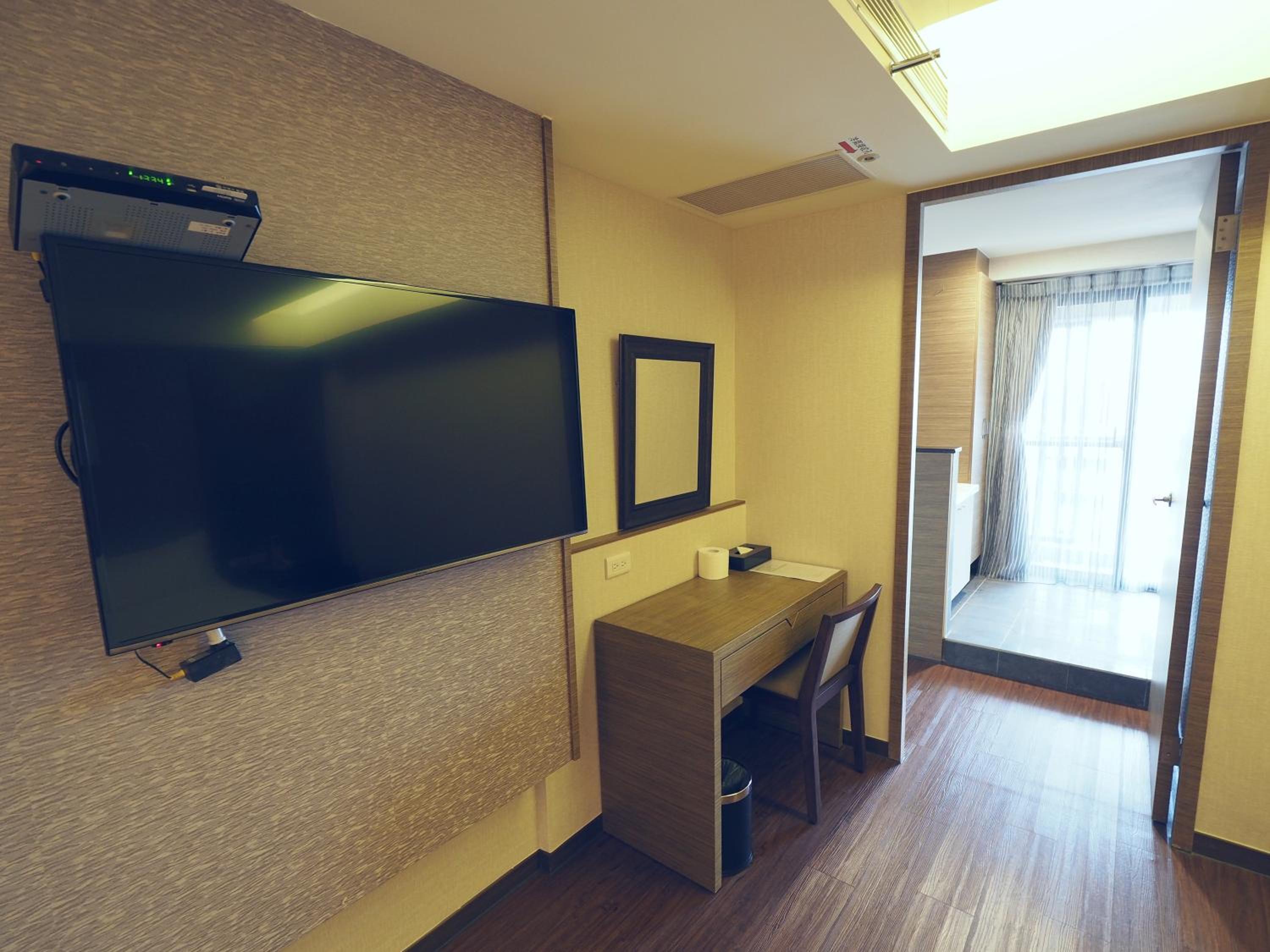 Deluxe Quadruple Room - Photo 9