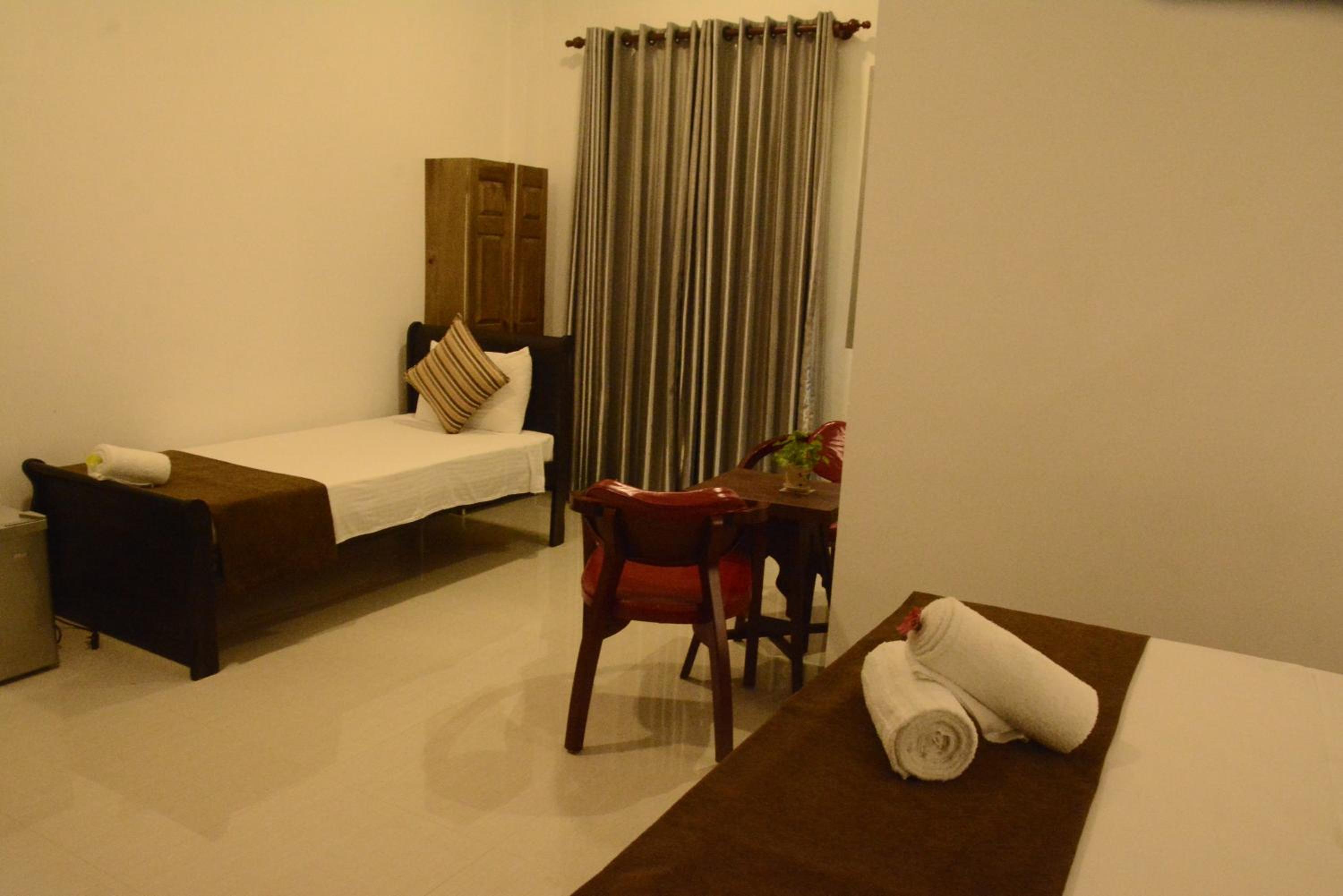 Deluxe Triple Room