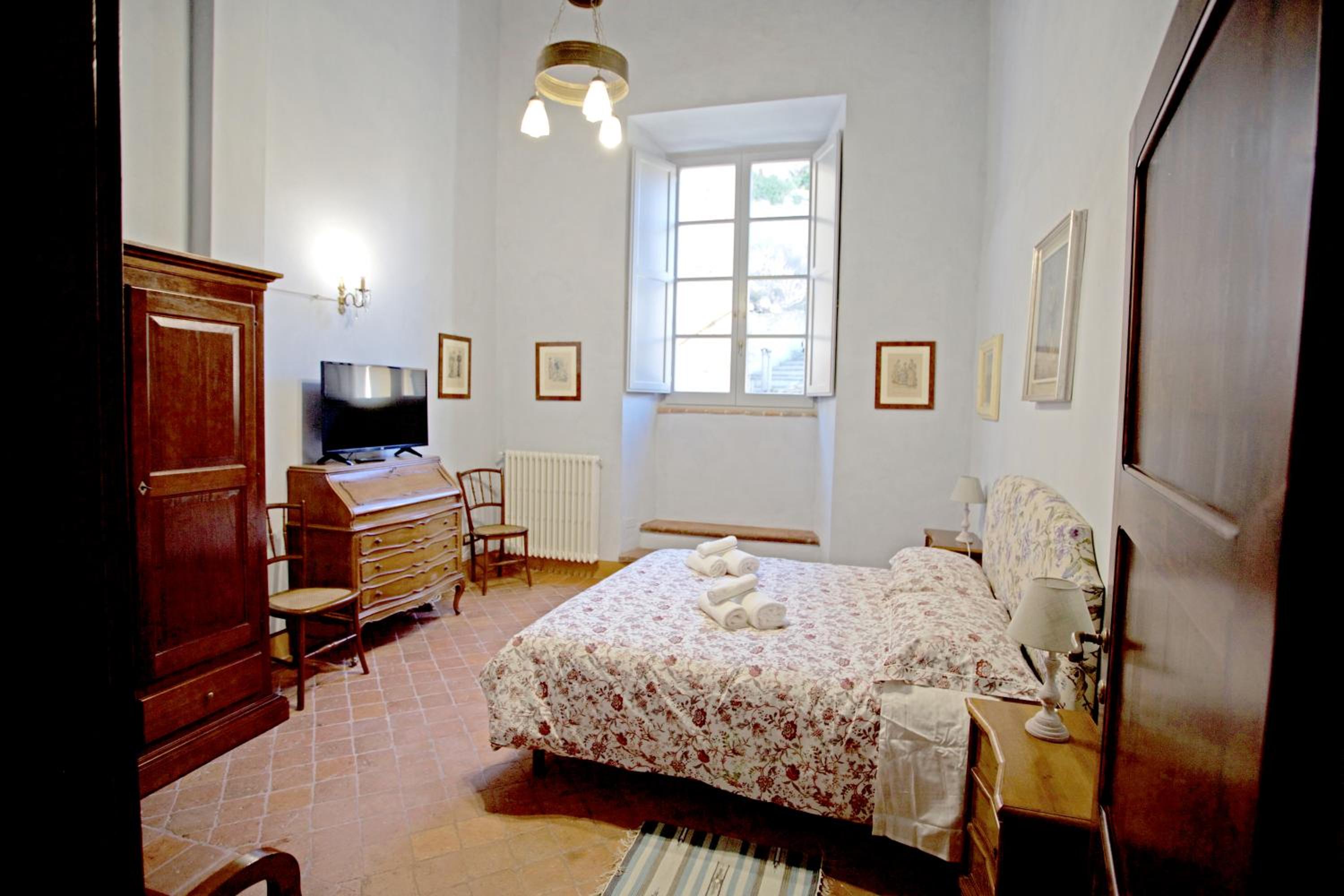 Three-Bedroom Apartment - Photo 32