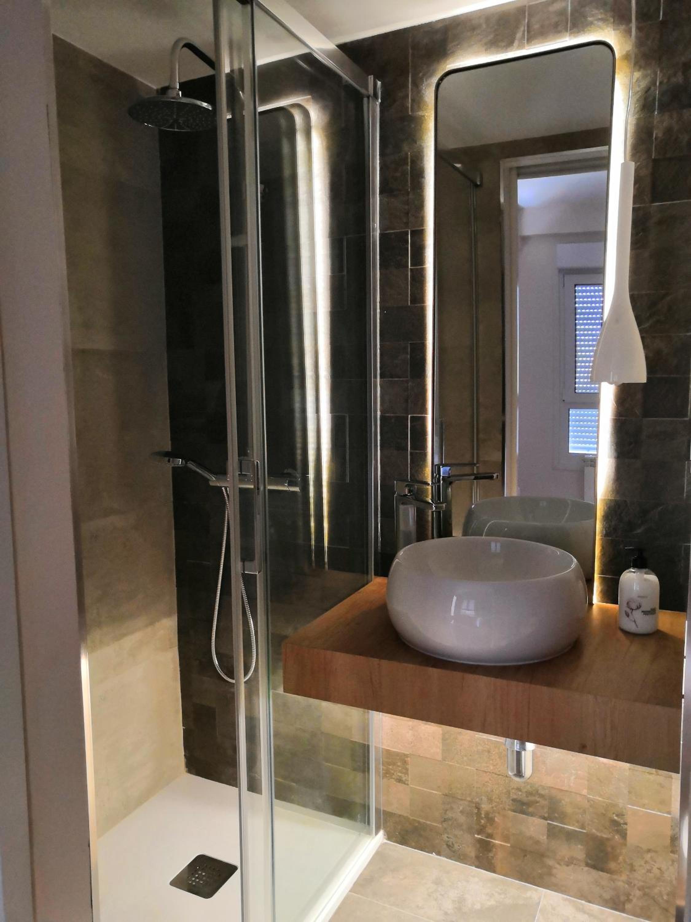 Three-Bedroom Apartment - Photo 12