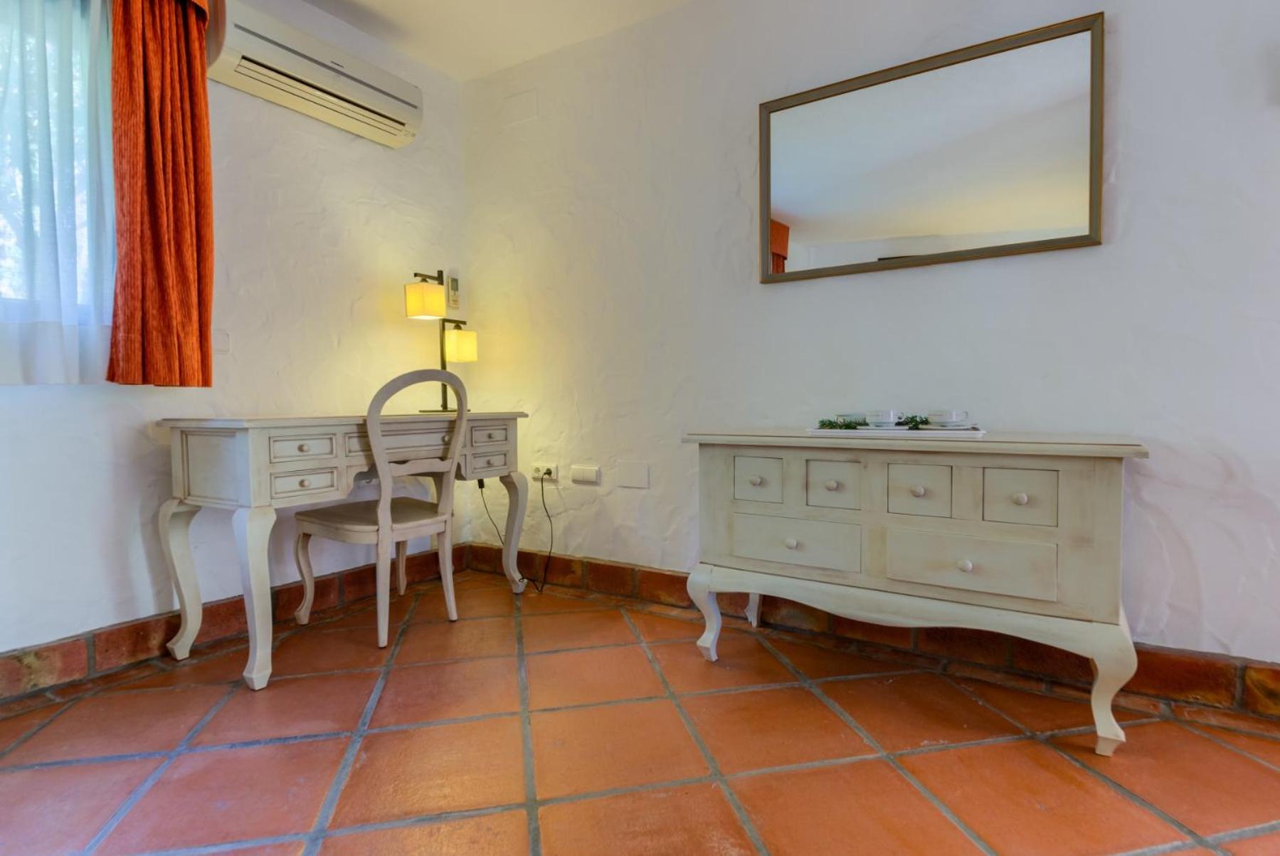 Apartamento de una habitación con vista al jardín