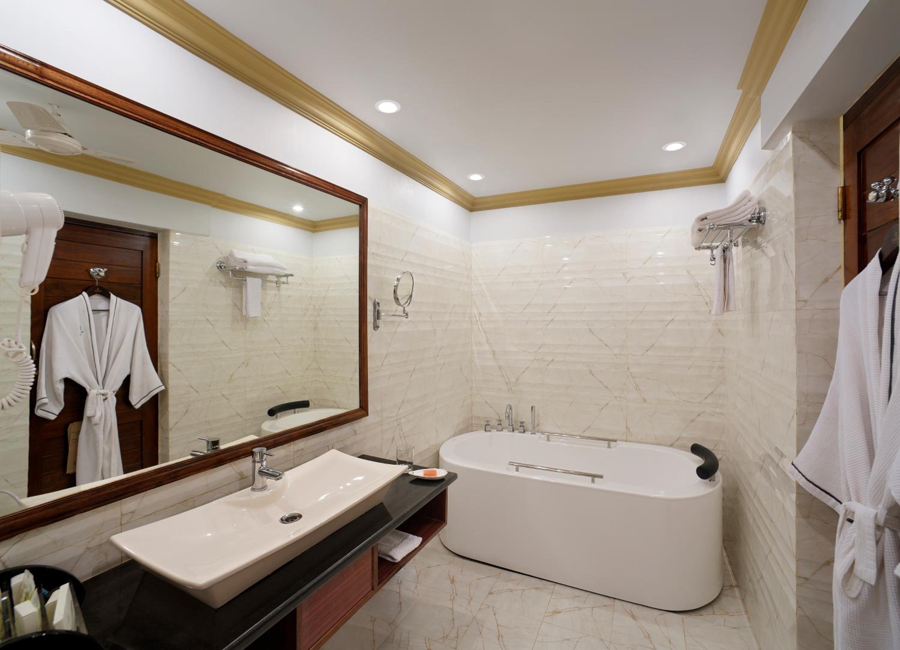 Deluxe Cottage King -  10% Discount on Foods & Soft Beverages* | 15% Discounts on Laundry Services* | INR 500 spa credit during your stay on selective Massage services. TnC Apply.* | Free Mini-bar - 2 cans of soft Beverages (Once on Arrival)  - Photo 2